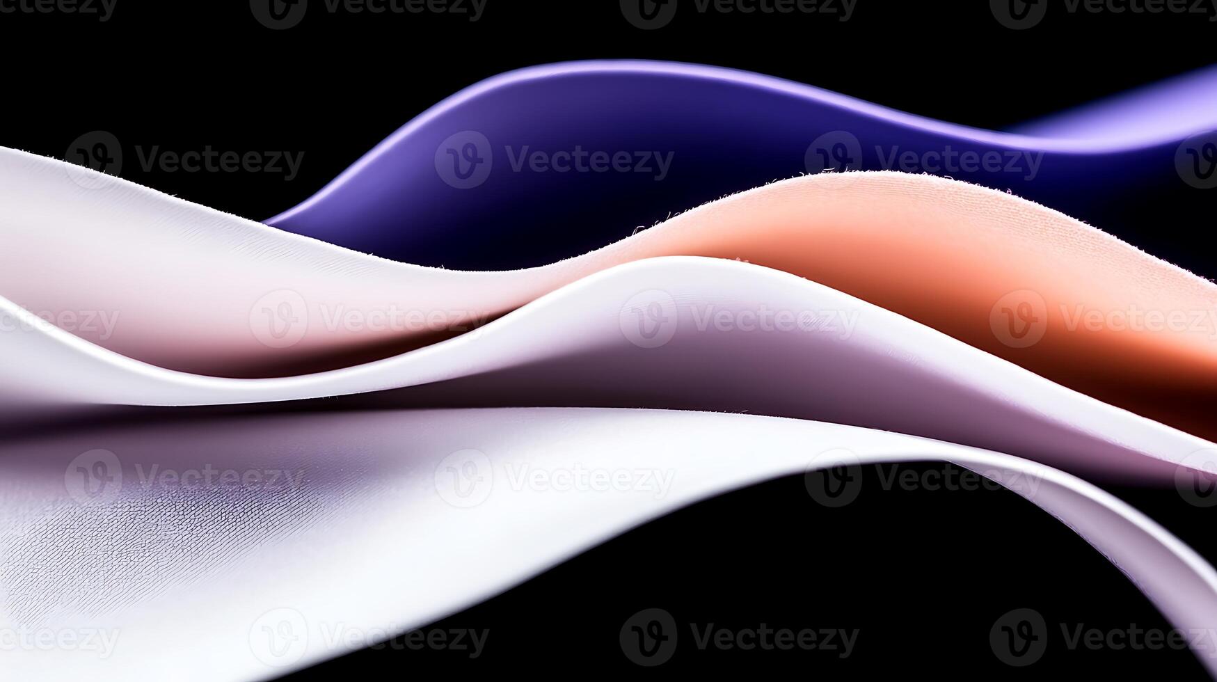 Abstract flowing fabric waves in soft pastel colors on a dark background, creating a serene atmosphere photo