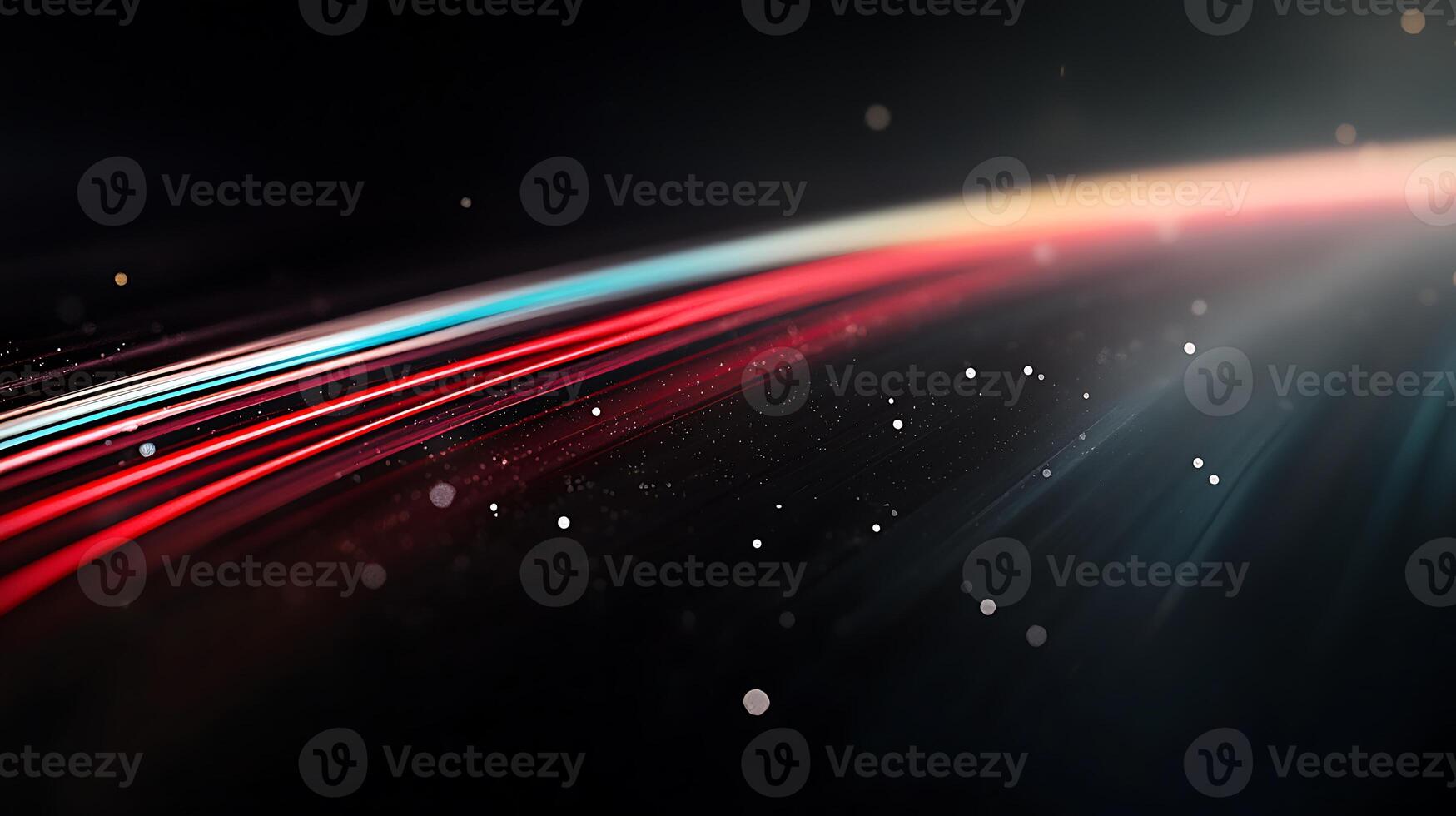 Abstract light trails with vibrant colors and particles creating a dynamic background effect photo