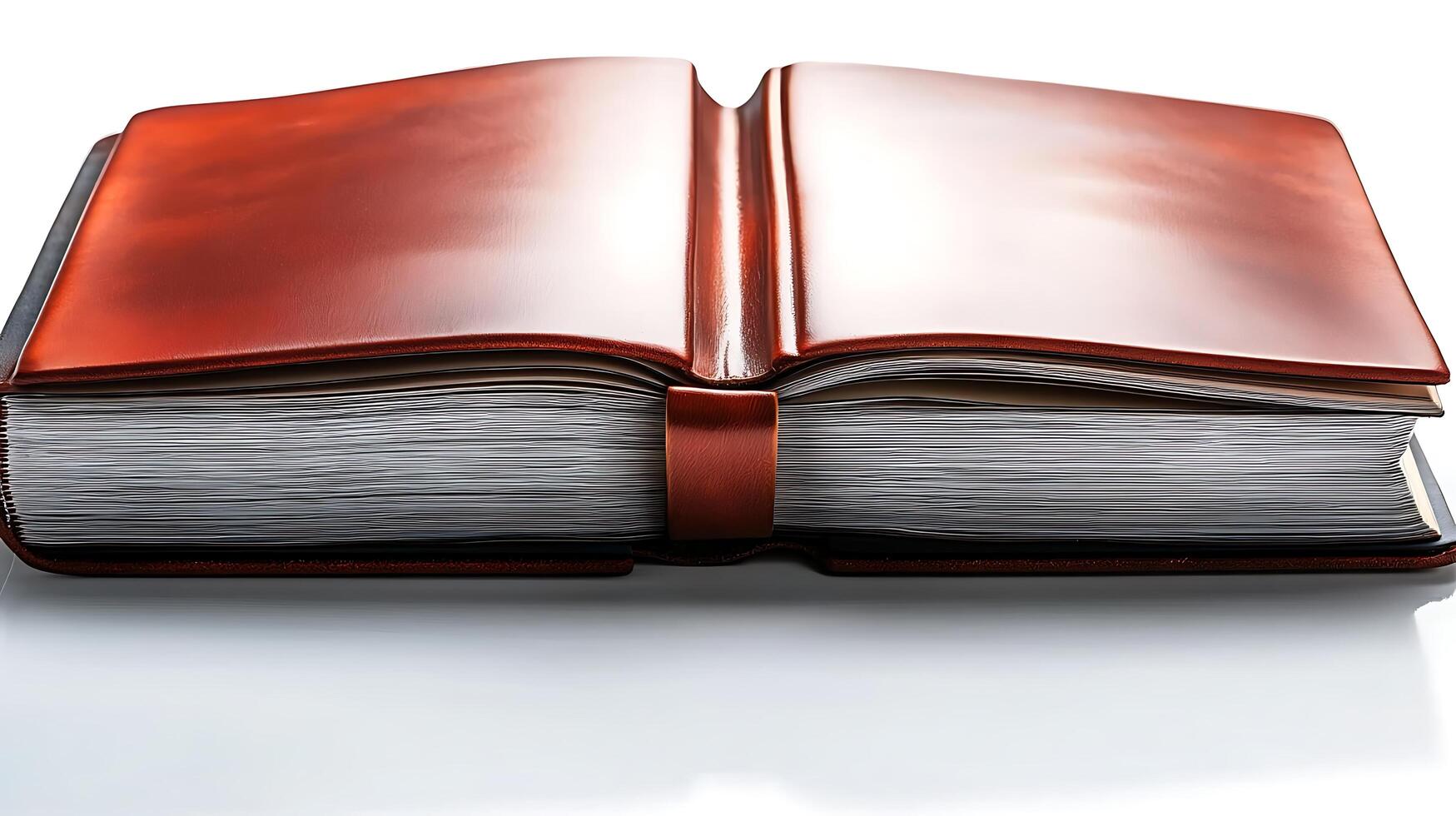 An open leather-bound book showcasing blank pages on a reflective surface, evoking creativity photo