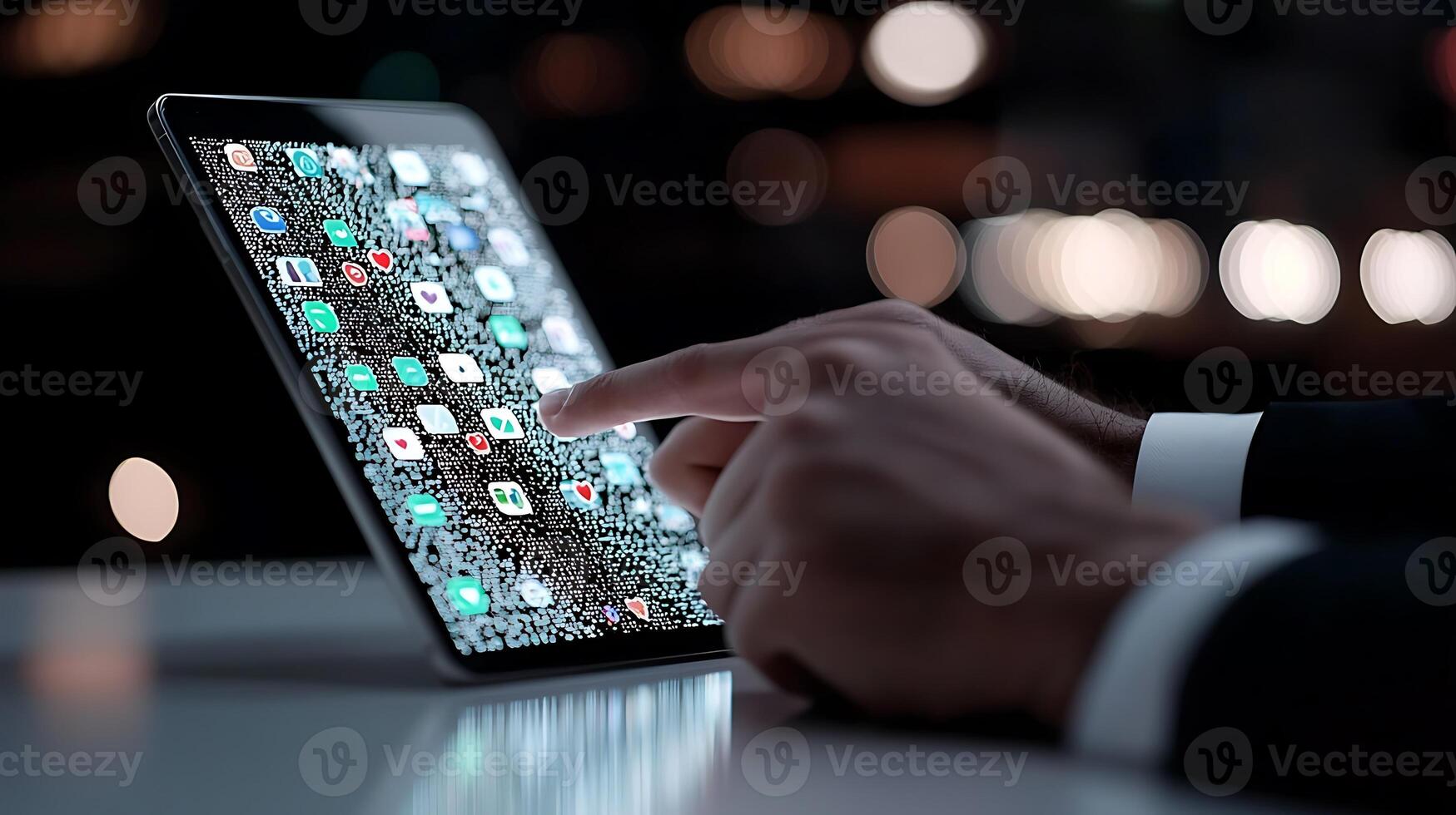 Business professional interacting with a tablet displaying various app icons in a modern setting photo
