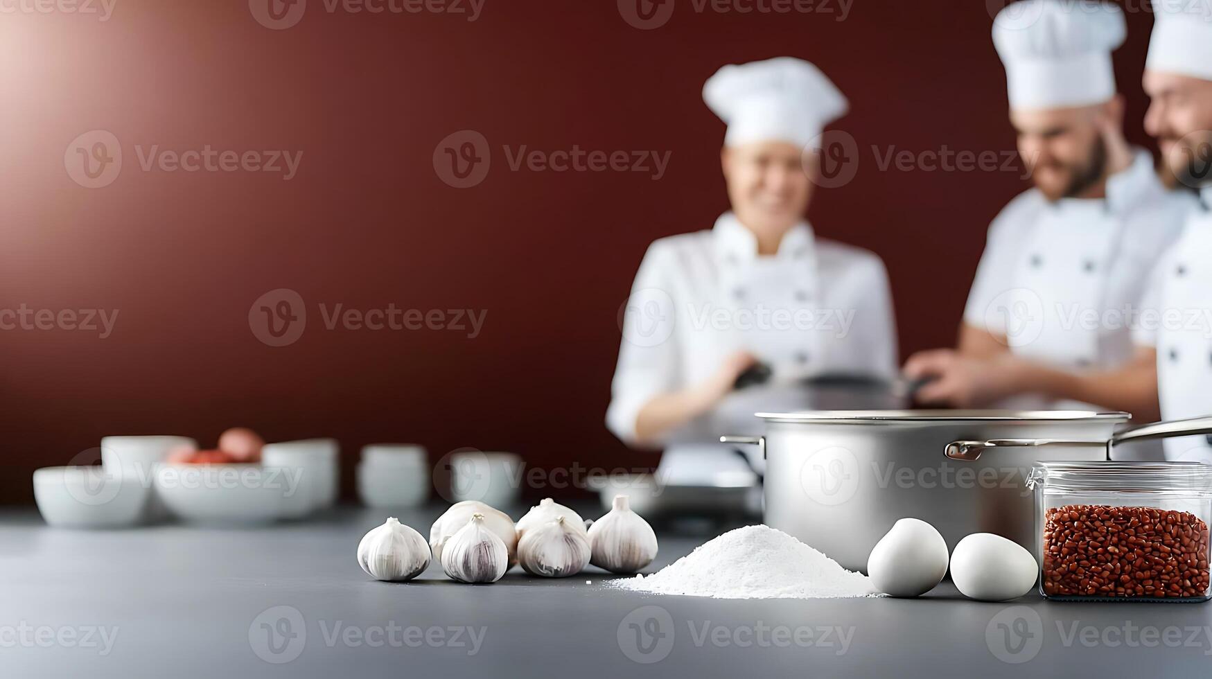 Chefs preparing a meal in a modern kitchen with ingredients like garlic and eggs on the table photo