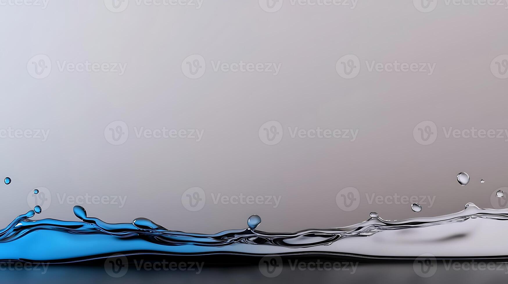 Close-up of a dynamic water splash with blue highlights against a smooth gray background photo