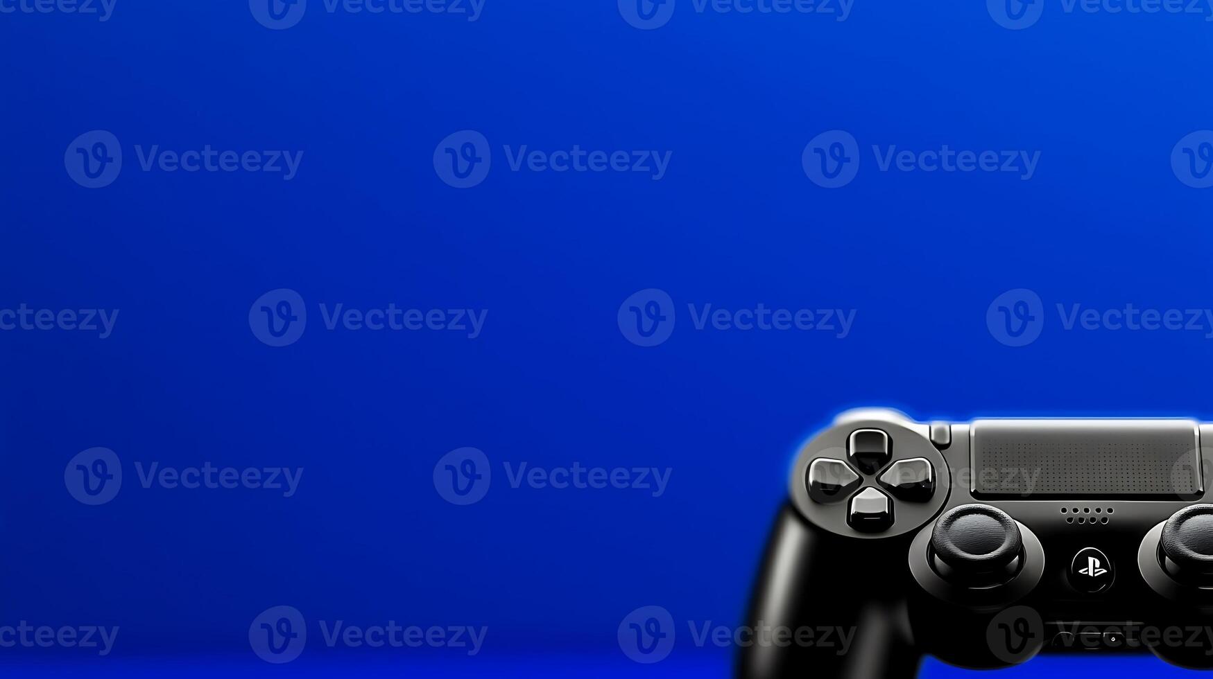 Close-up of a gaming controller on a vibrant blue background, showcasing modern technology in leisure photo