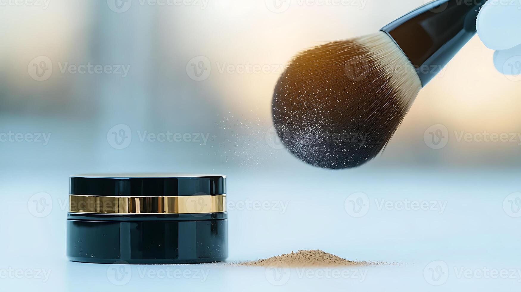 Close-up of a makeup brush applying powder from a sleek black container on a blurred background photo