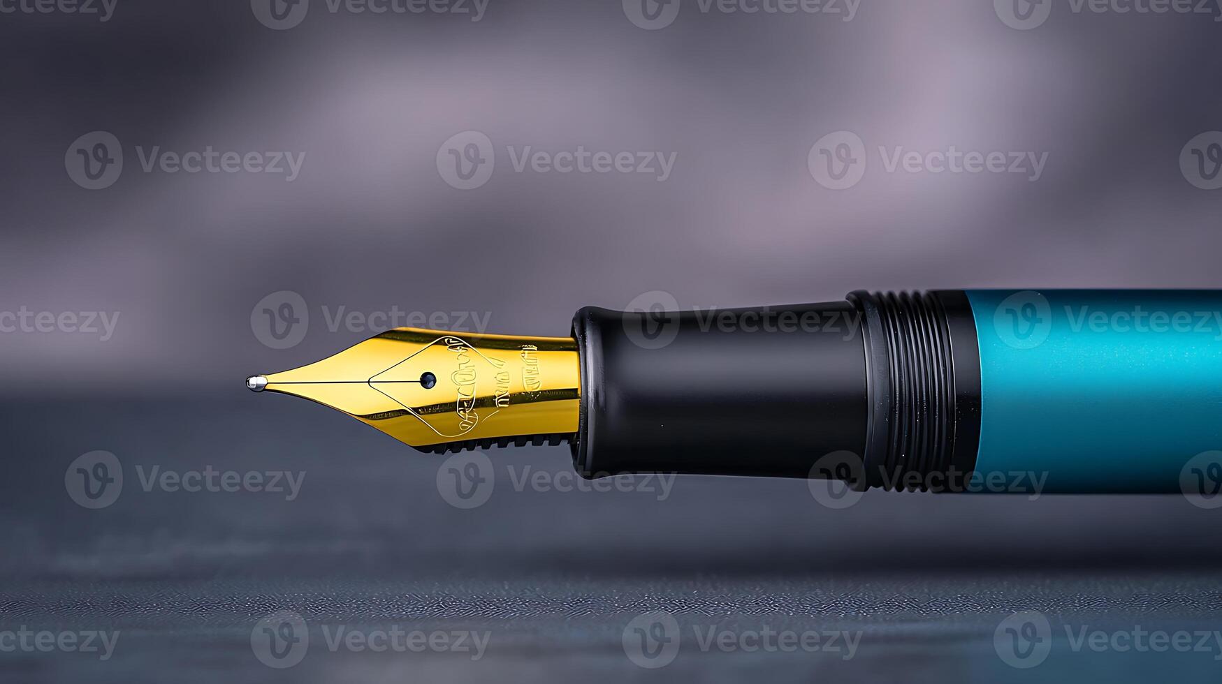Close-up of a sleek fountain pen with a golden nib on a textured background, ideal for writing photo