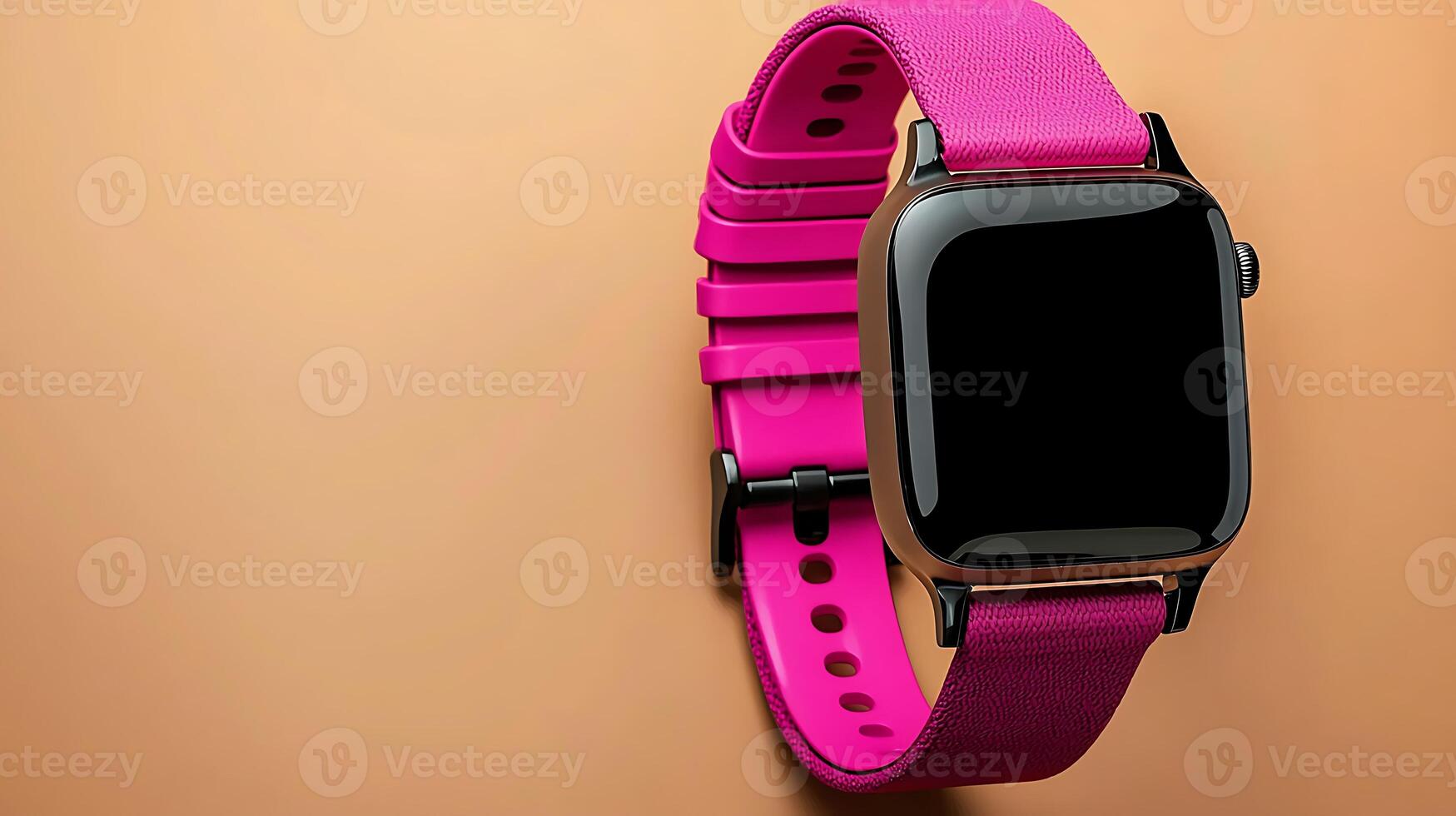 Close-up of a sleek smartwatch with a vibrant pink strap against a warm-toned background photo