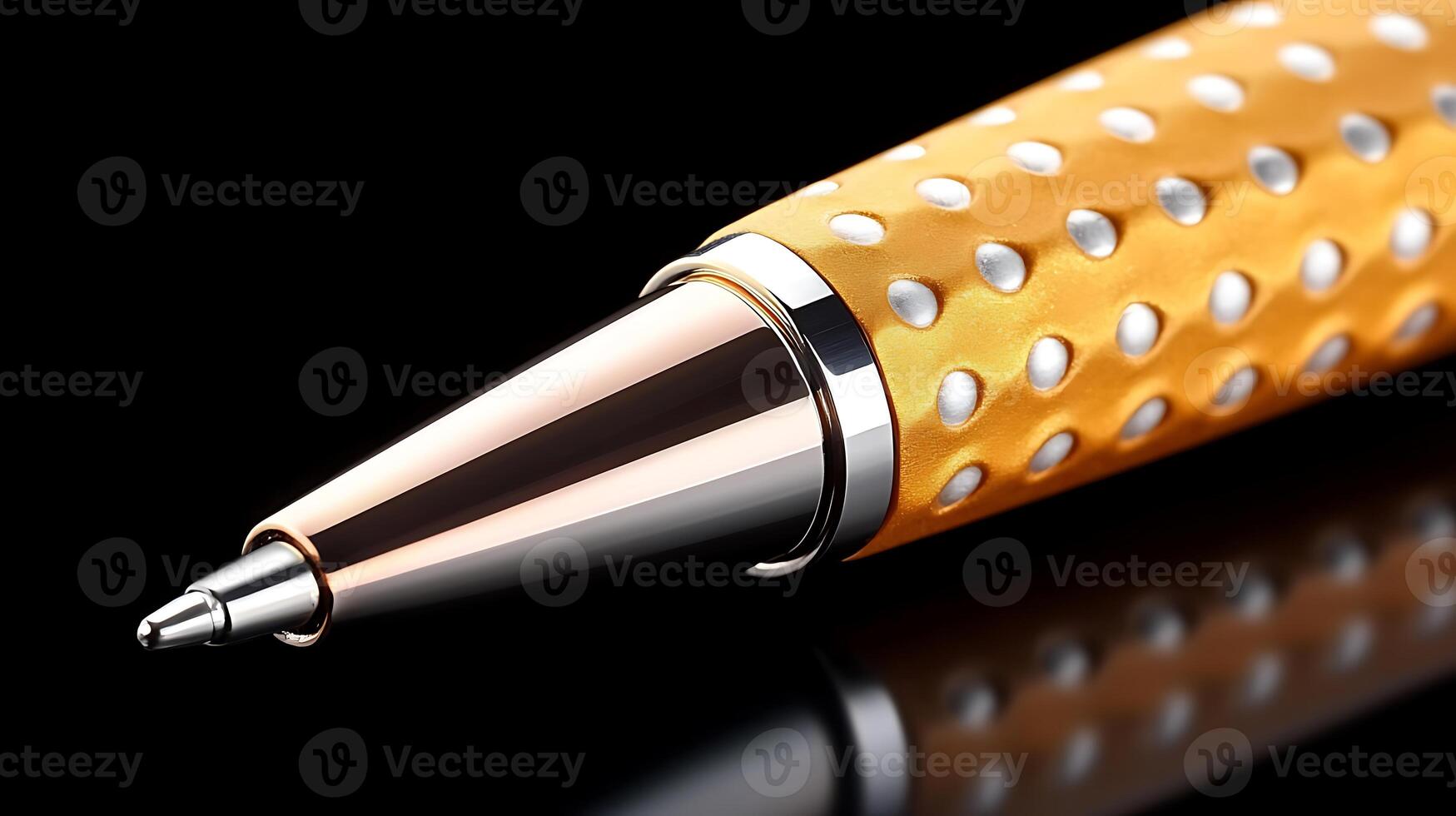 Close-up of a stylish yellow pen with a textured grip against a reflective black background photo