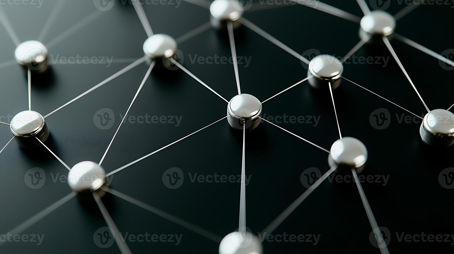 Close-up view of interconnected metallic nodes on a sleek black surface, symbolizing technology photo