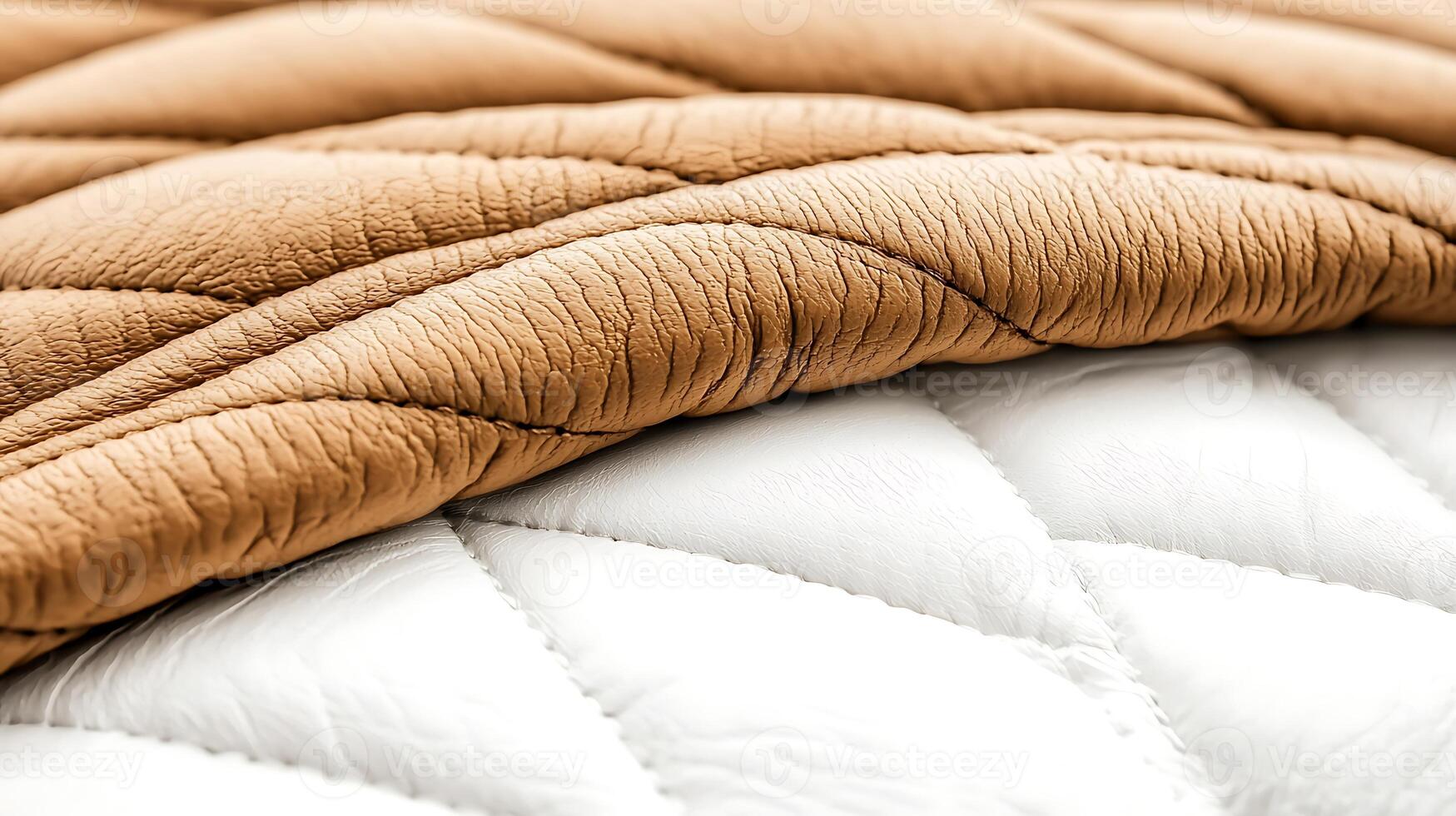 Close-up view of textured quilted fabric showcasing intricate stitching and color contrast photo