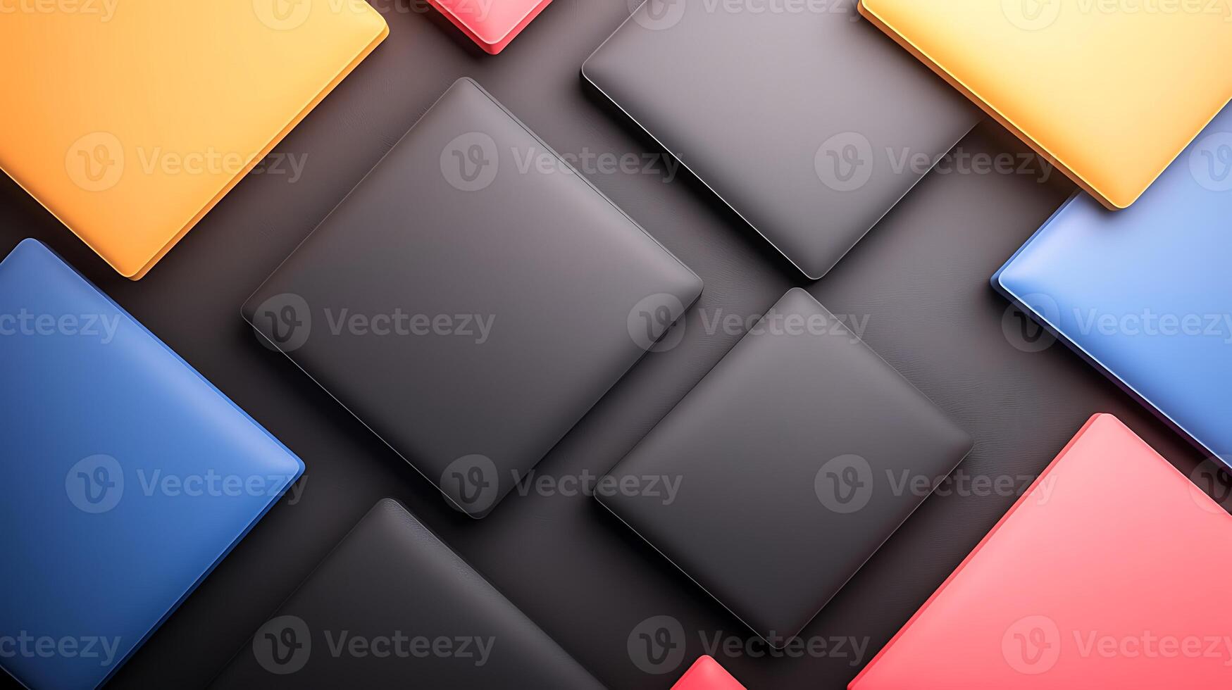 Colorful arrangement of laptop covers on a dark surface, showcasing design and texture diversity photo