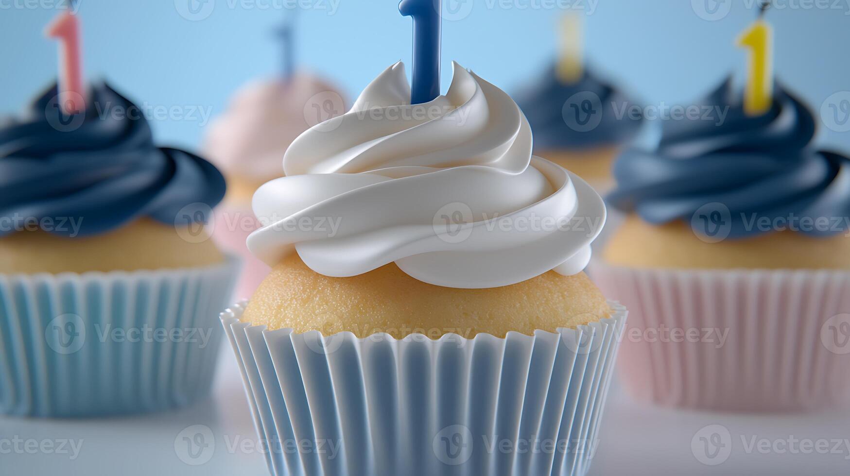 Colorful birthday cupcakes with blue and pink frosting, featuring number one candles, set against a soft background photo