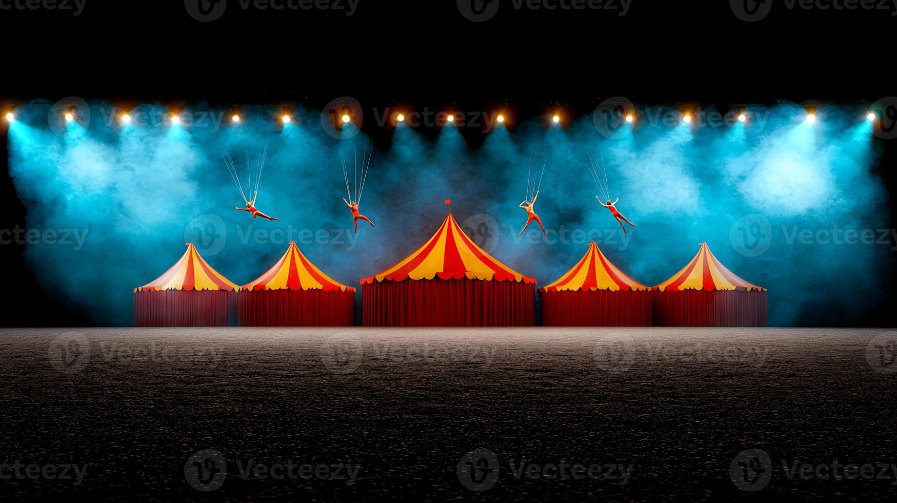 Colorful circus tents illuminated by bright lights, with acrobats performing in the background photo