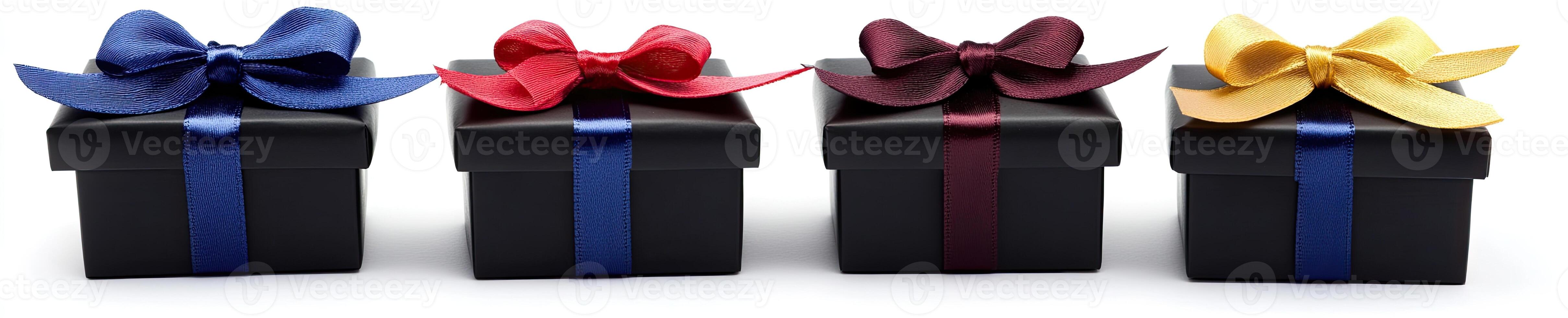 Four black gift boxes with colorful bows photo