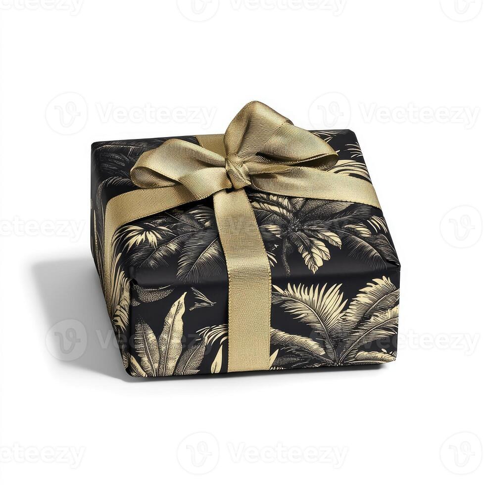 Black gift box with gold palm leaf pattern photo