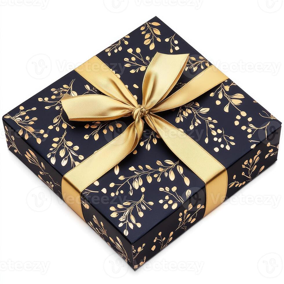 Gift box with gold ribbon and floral design photo