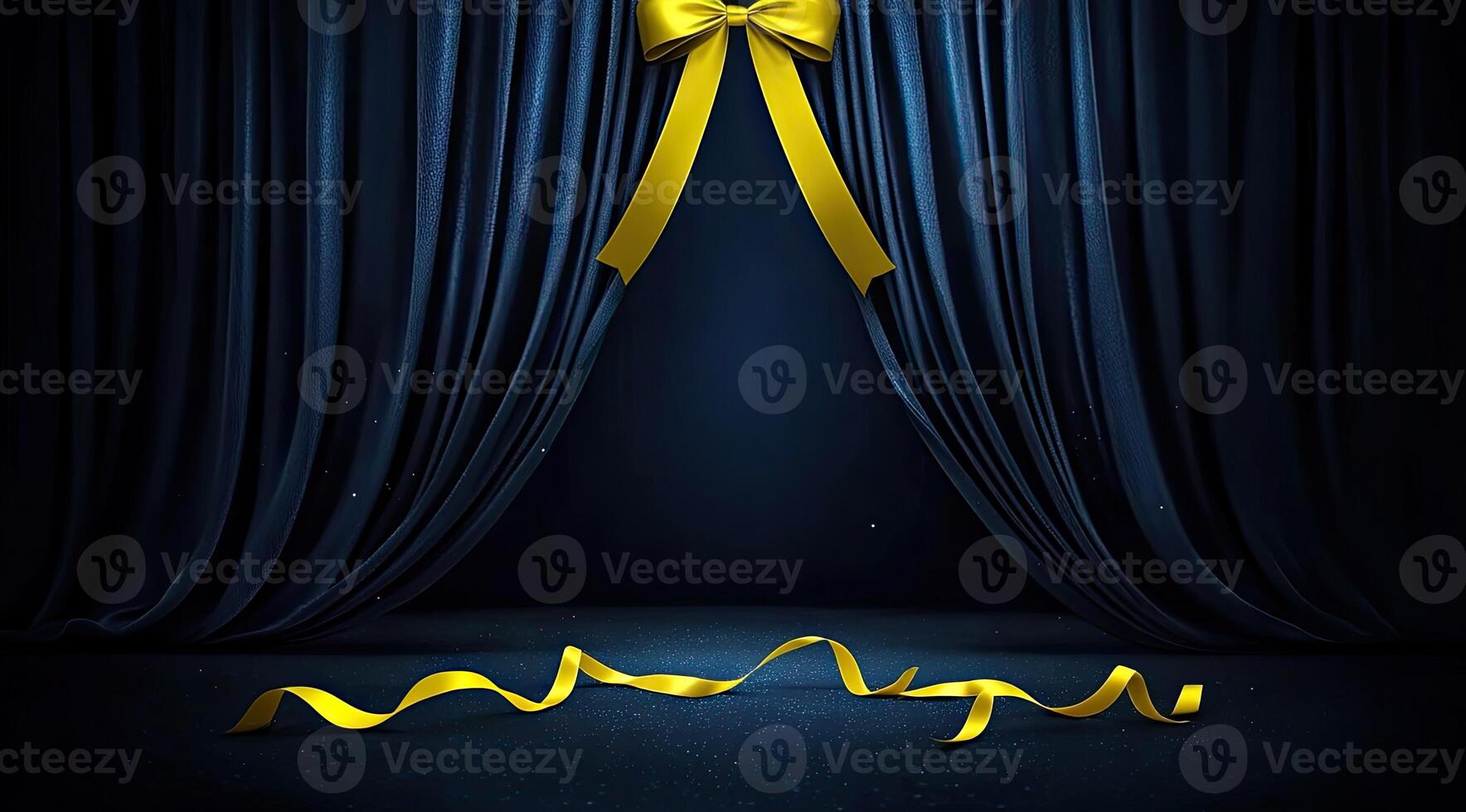 Dark stage with a yellow ribbon bow photo