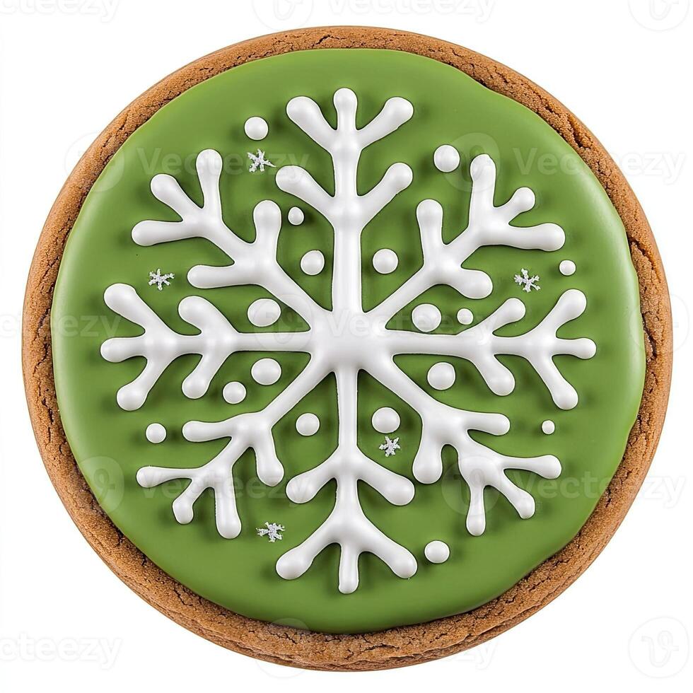 Round, green iced Christmas cookie with a snowflake design photo