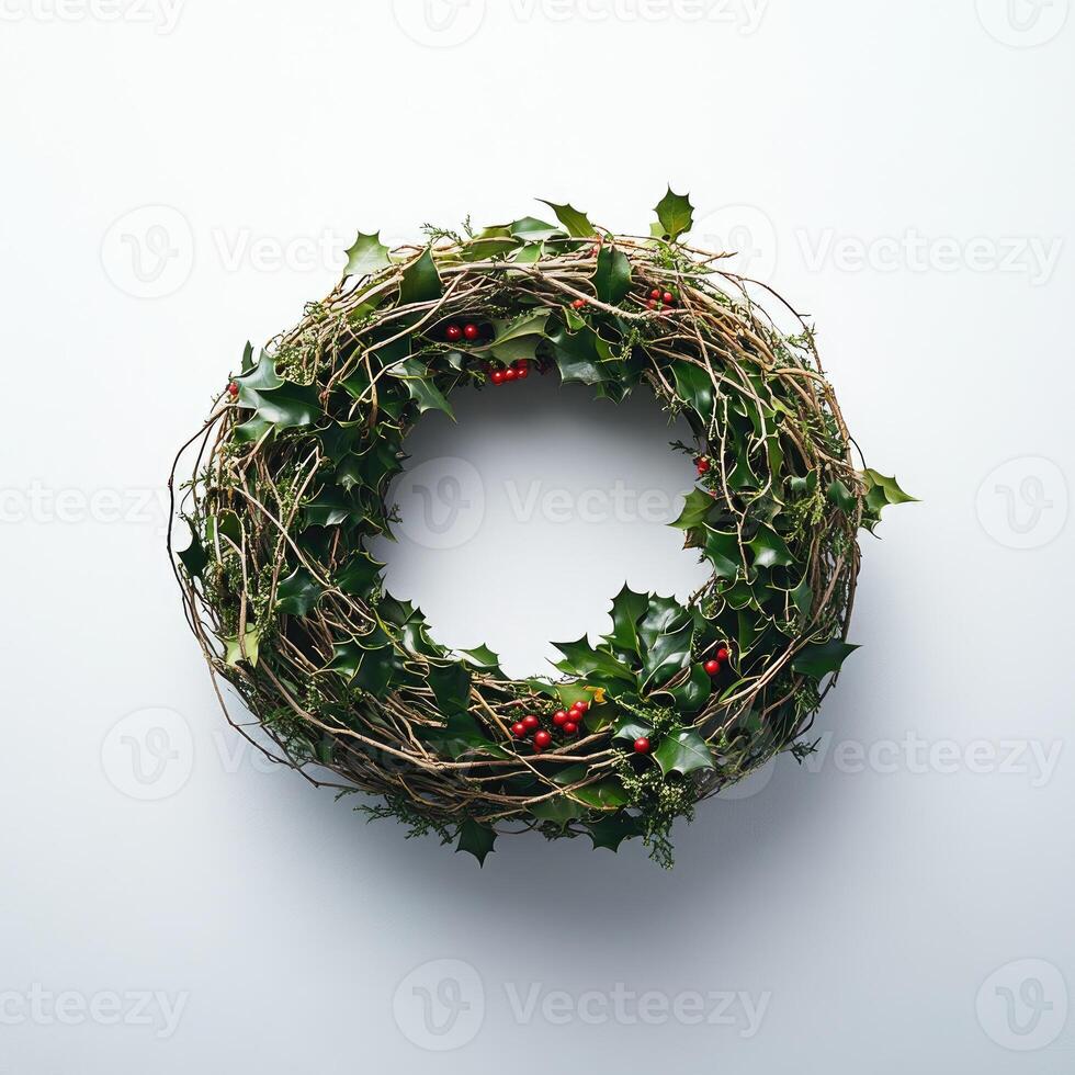 Circular Christmas wreath with holly and berries photo
