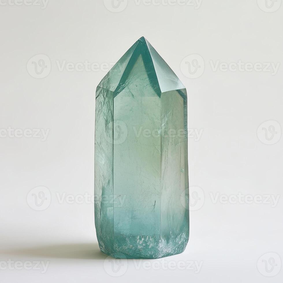 Teal-hued crystal point photo