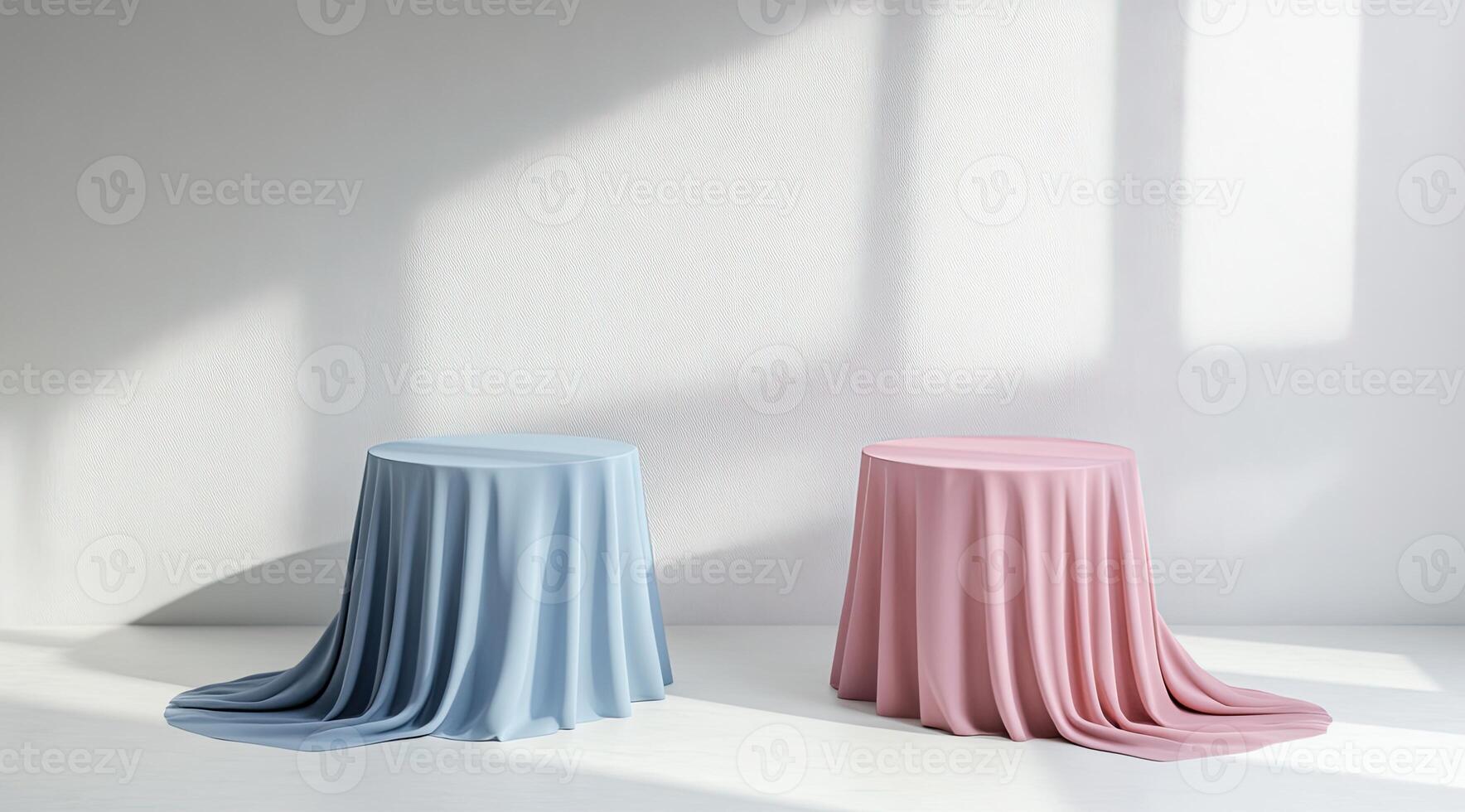 Two draped round display platforms in light pastel colors photo