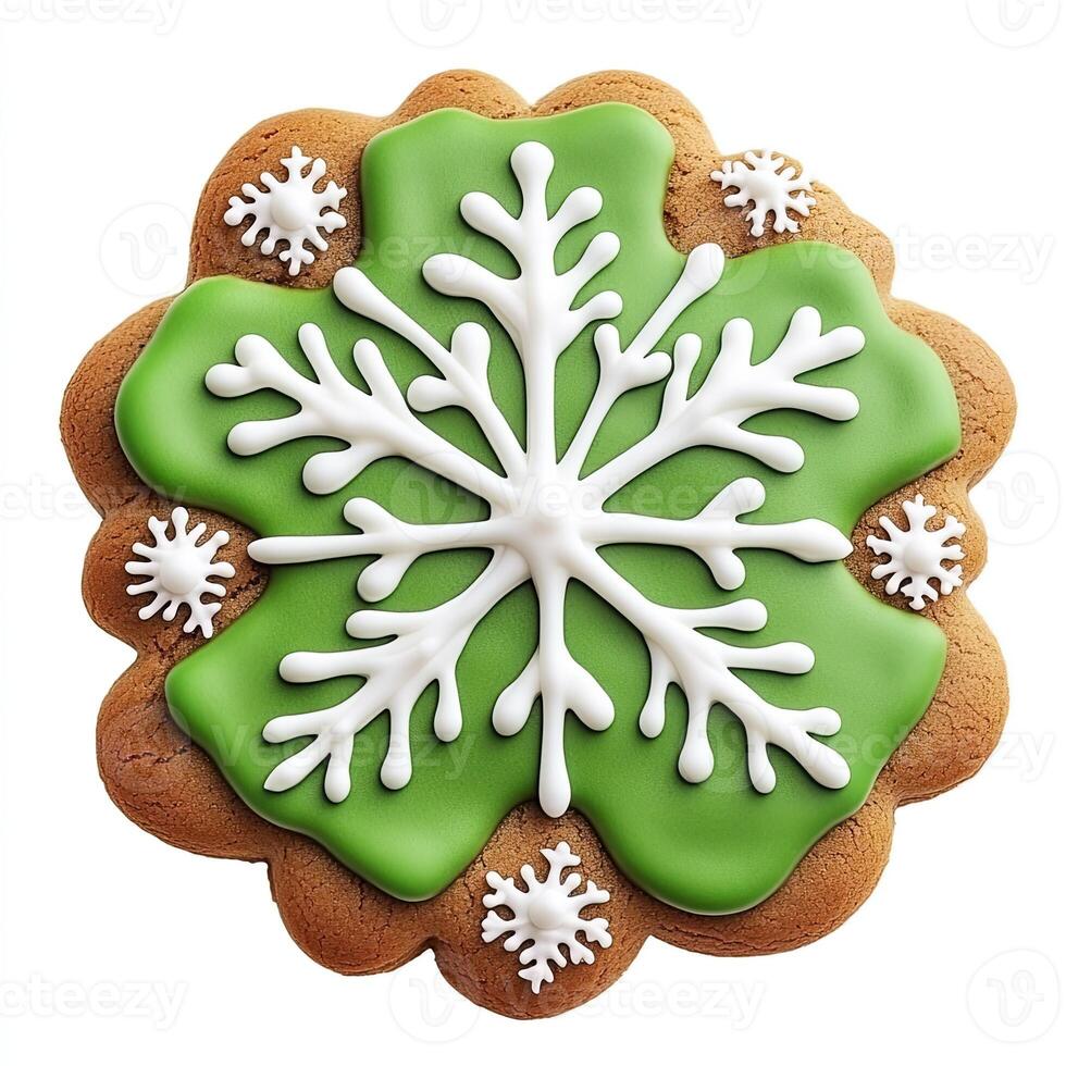 Festive, round, gingerbread cookie decorated with a detailed snowflake design in white icing on a vibrant green icing background photo