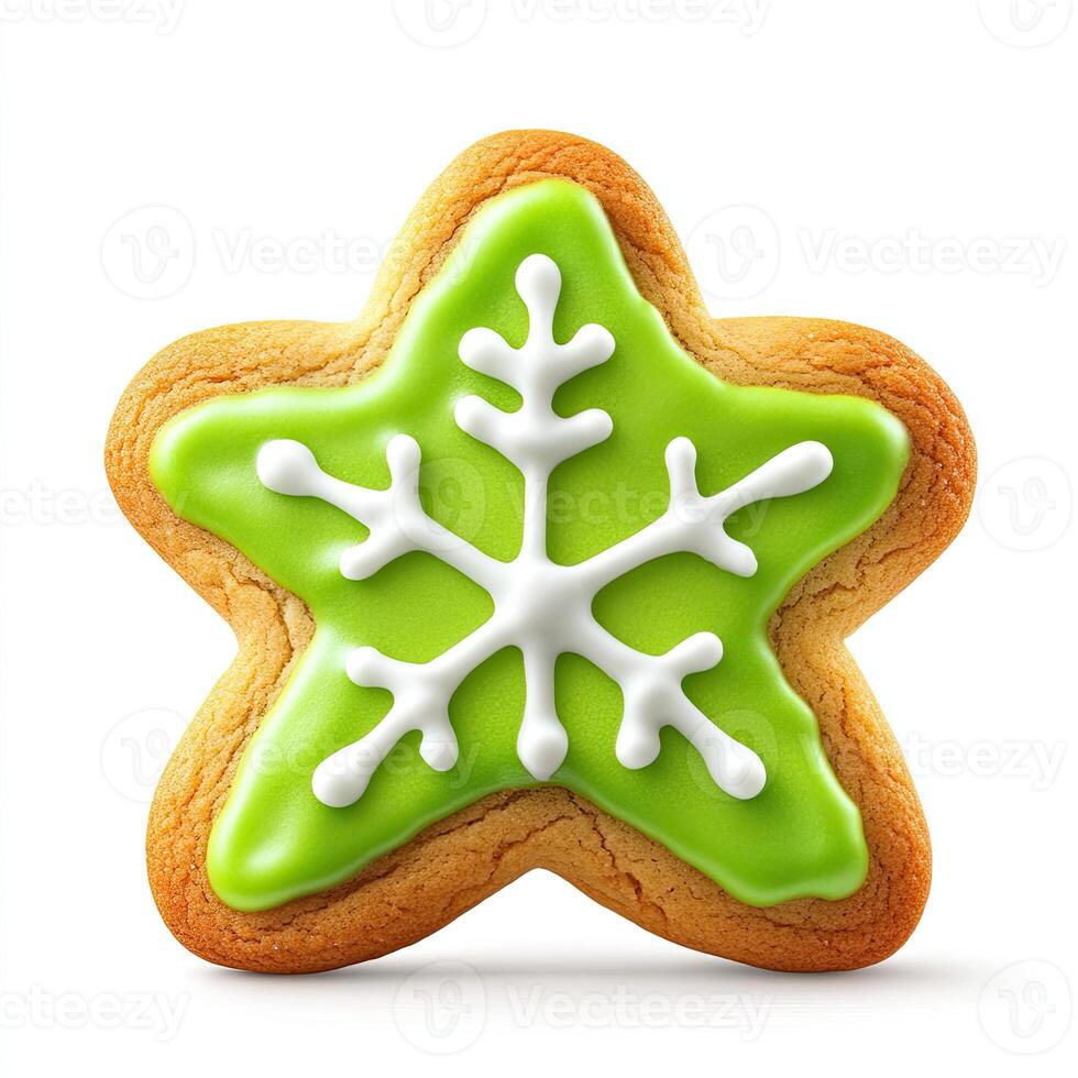 Festive star-shaped cookie with a green icing snowflake design photo