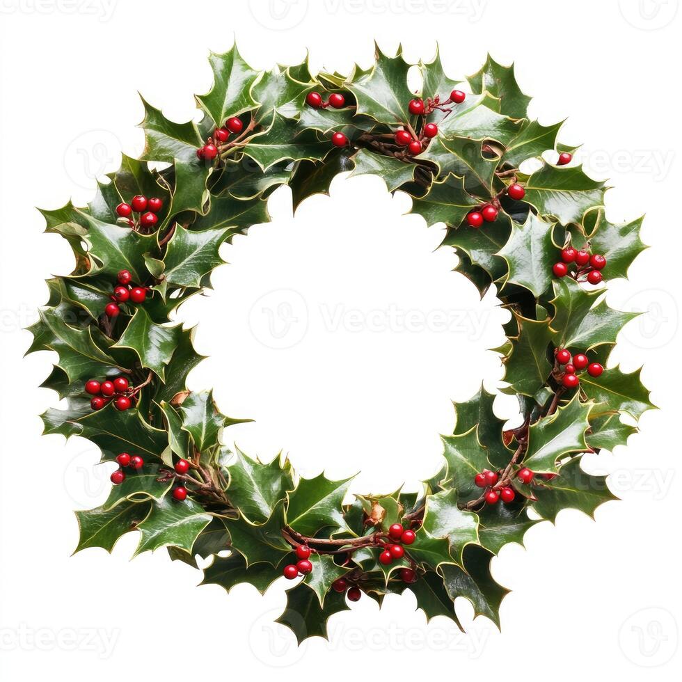 Circular Christmas wreath of holly leaves and red berries photo