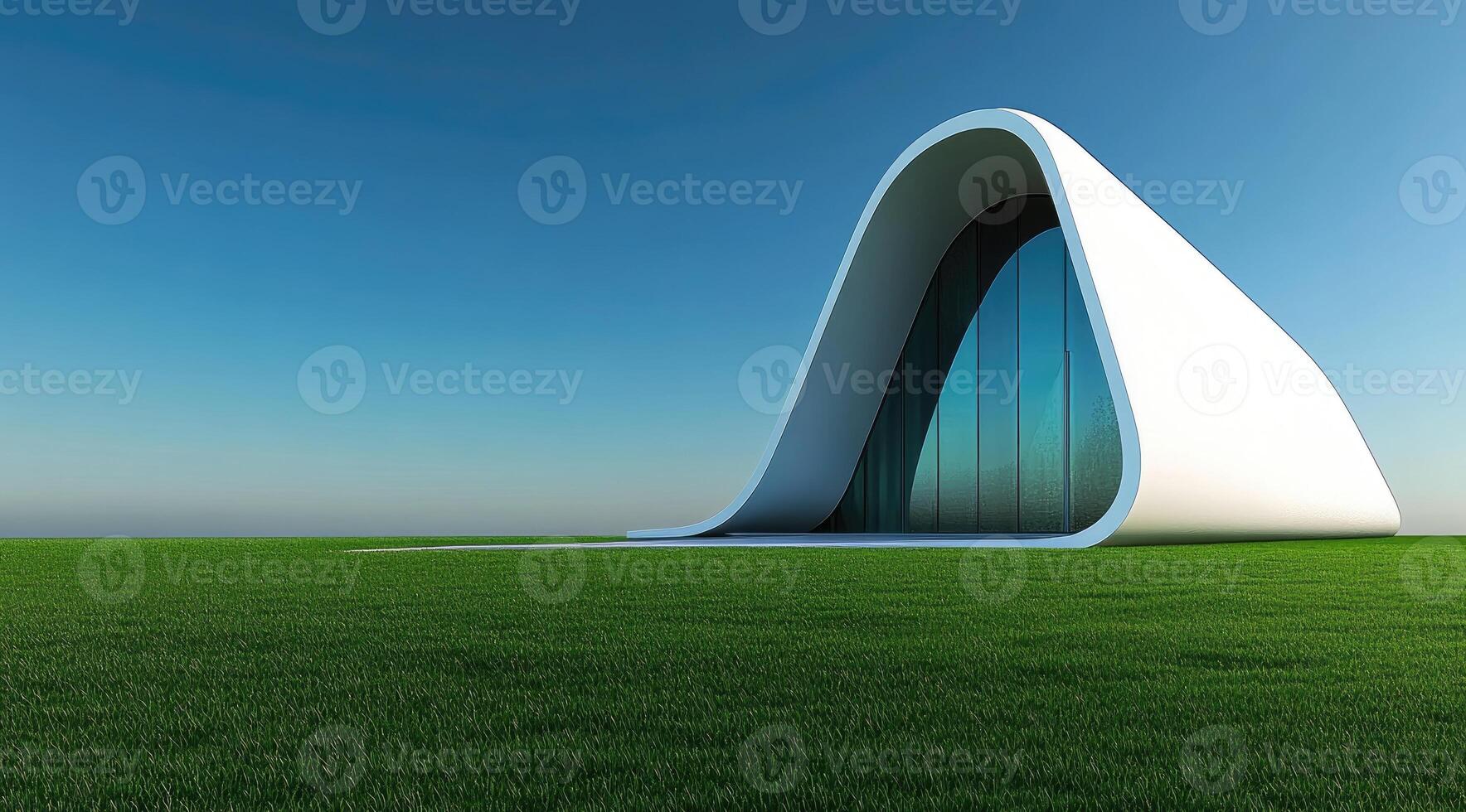 Modern, curved building on a grassy plain photo