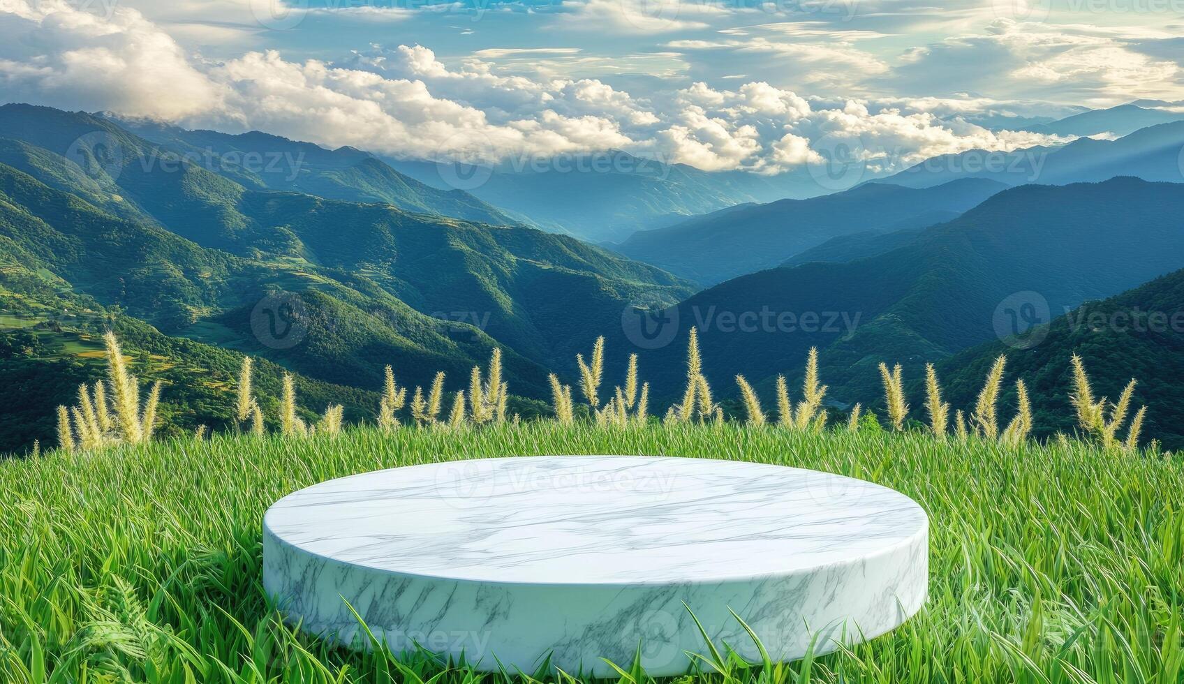 Elevated white marble podium amidst lush green grass, mountain backdrop photo