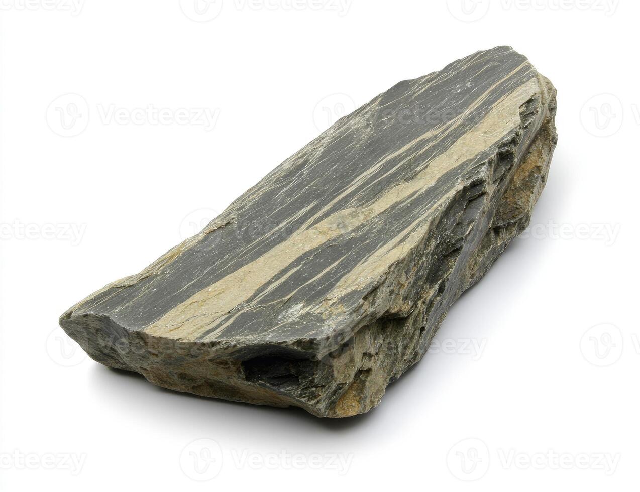 Rough, dark gray and tan rock photo