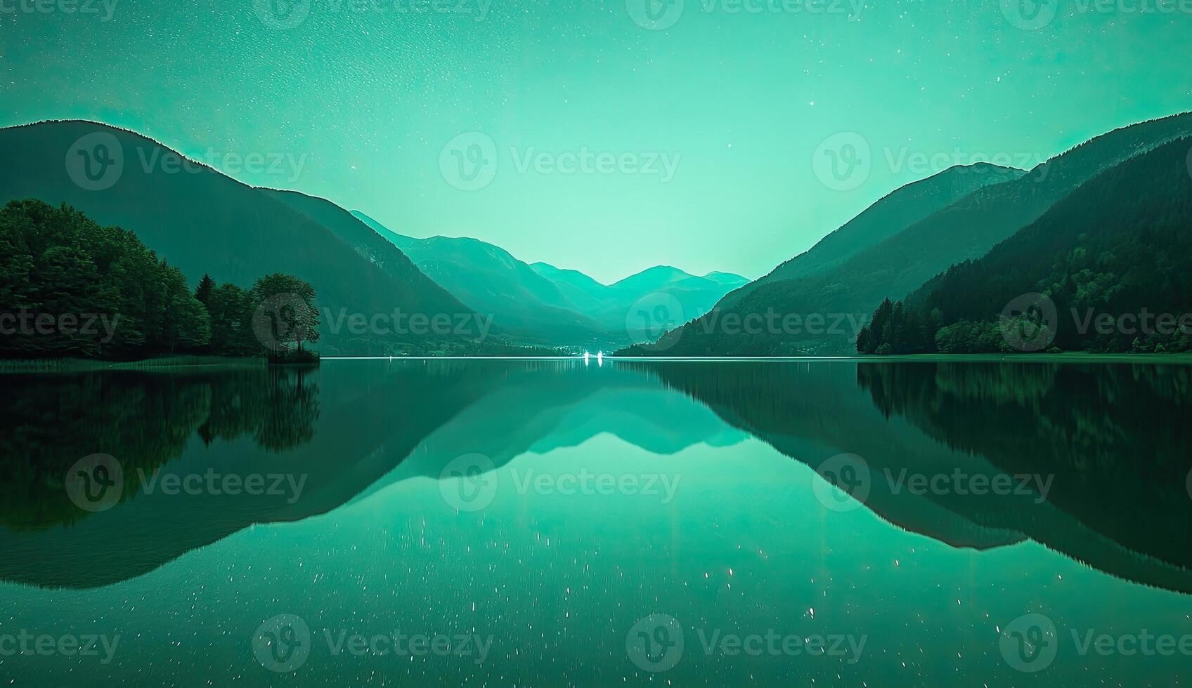 Serene lake reflecting starry night mountains photo