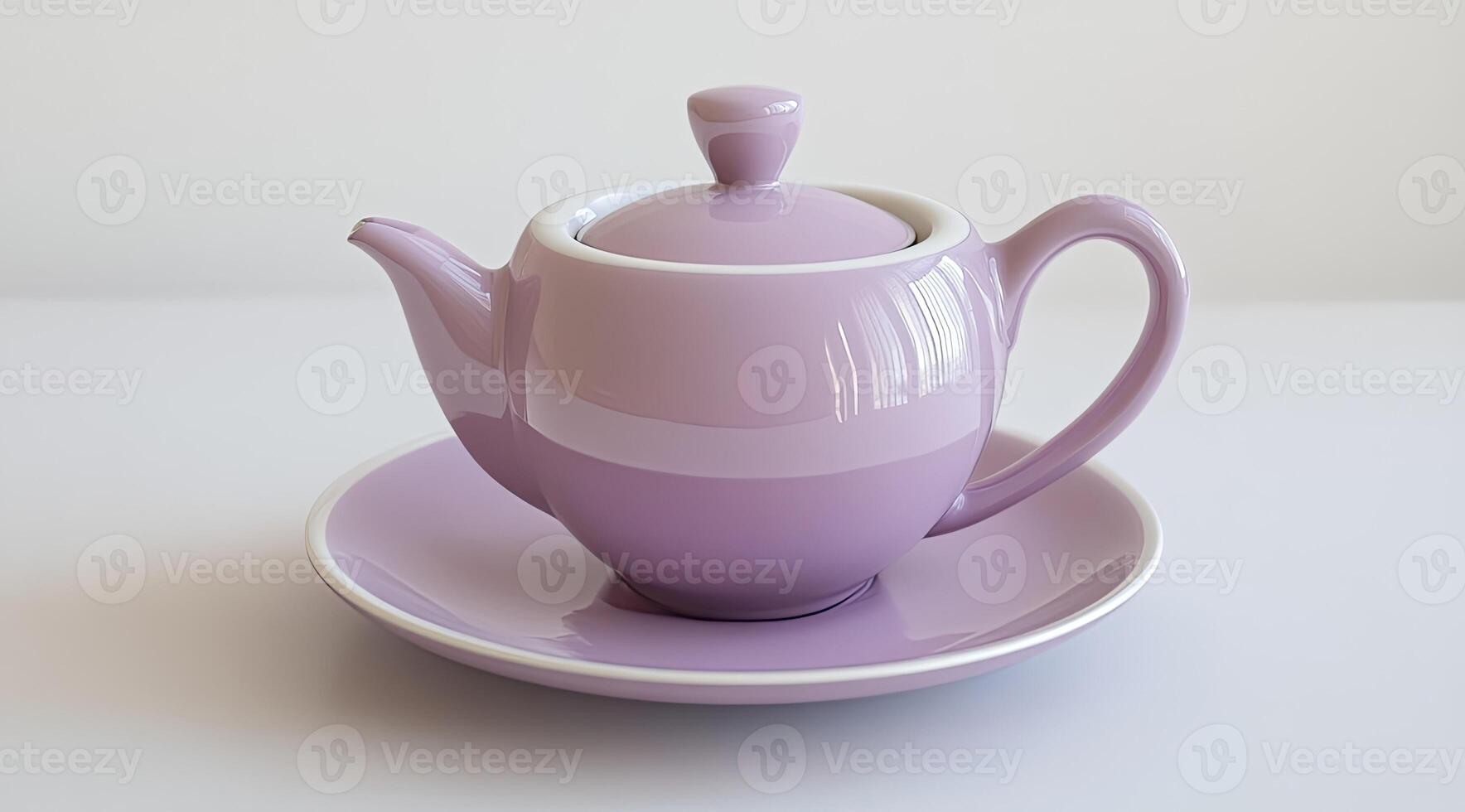 Elegant, lavender-colored teapot and saucer photo