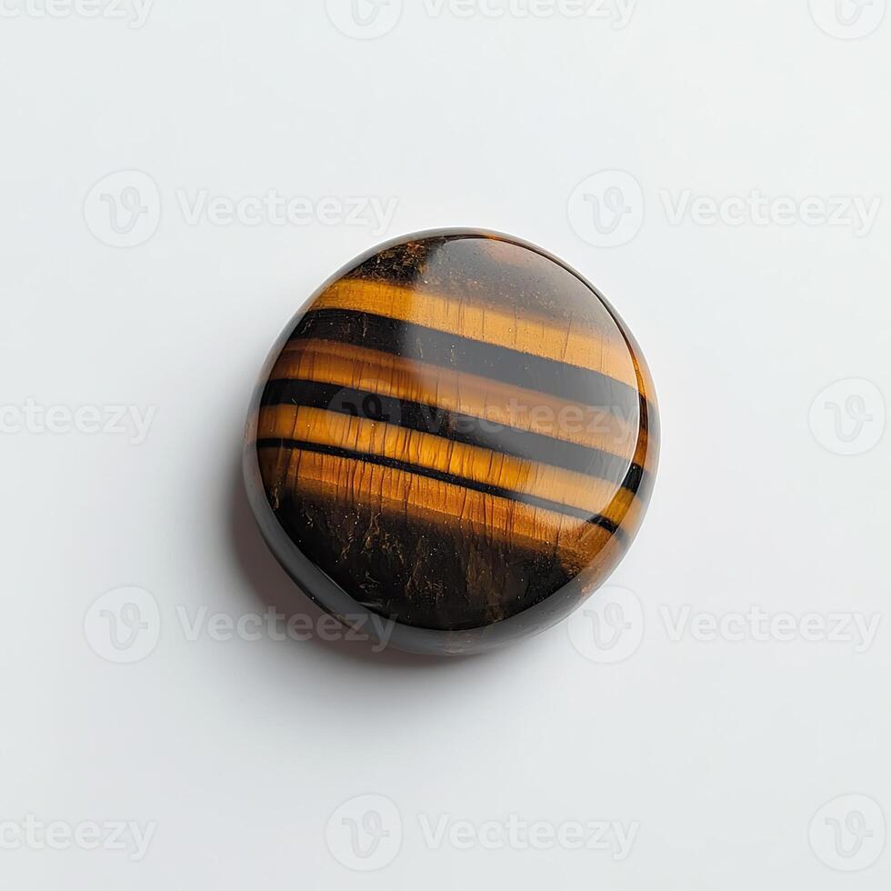 Polished tiger eye cabochon photo