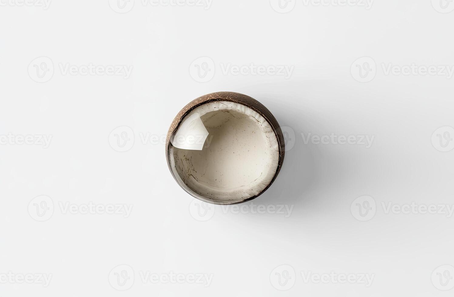 Fresh coconut half, top view photo