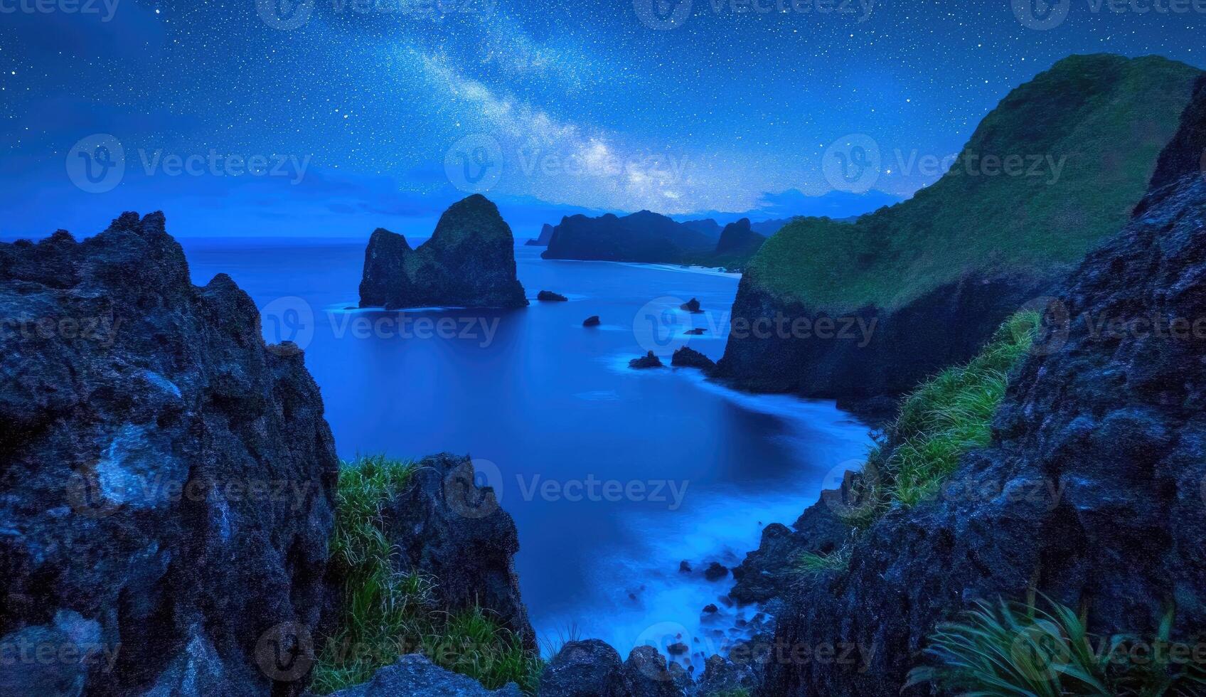 Coastal night scene with vibrant starry sky photo