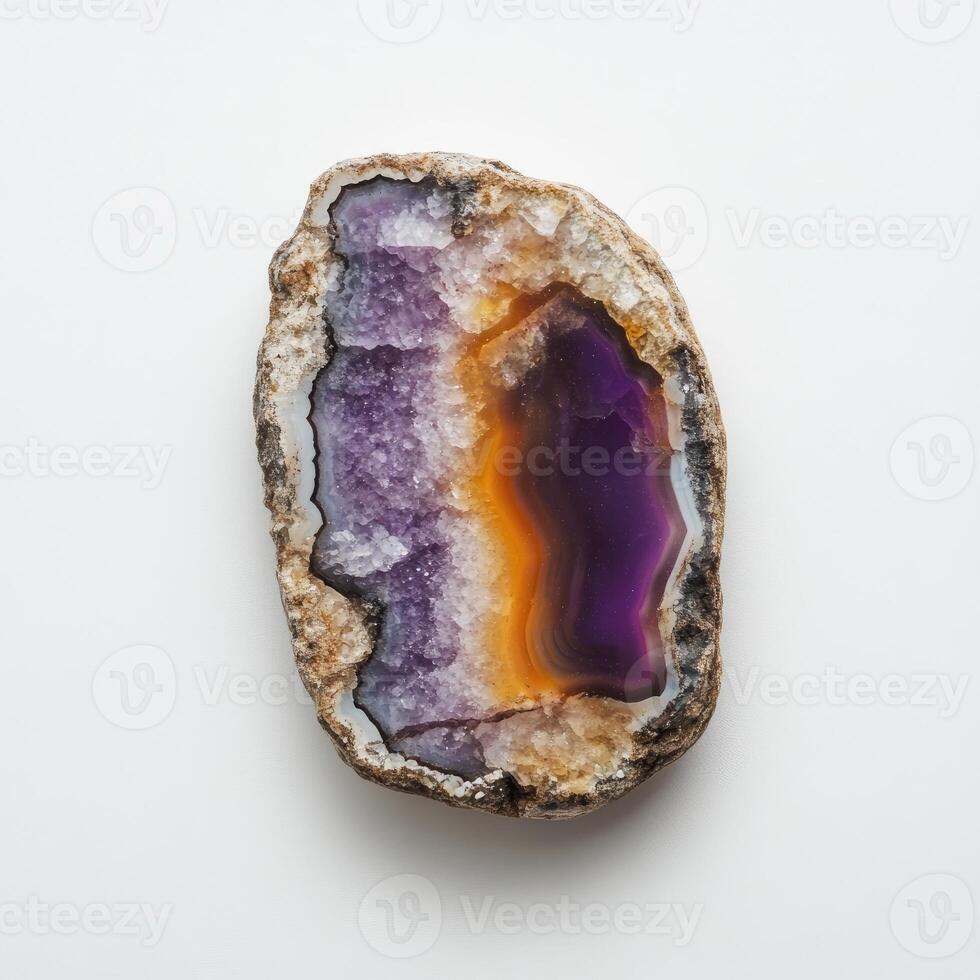 A slice of agate, showcasing a vibrant blend of purple and orange photo