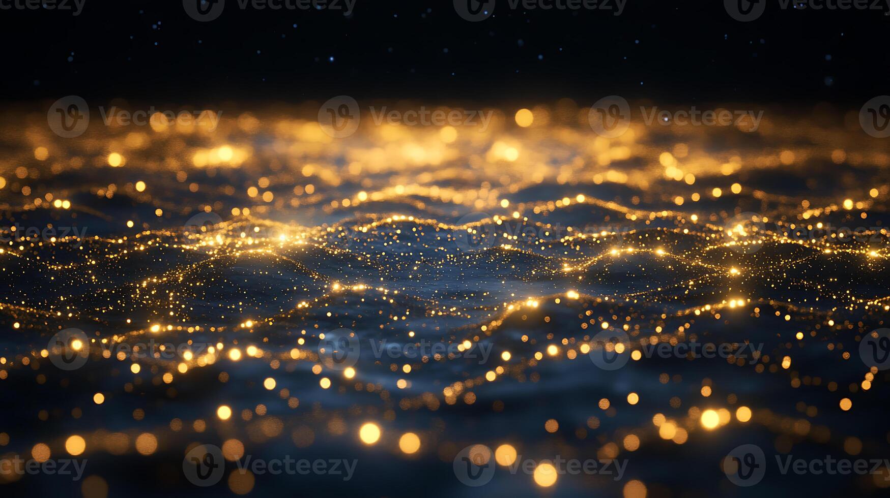 Abstract Golden Dots Forming a Luminous Wave Pattern on Dark Background photo