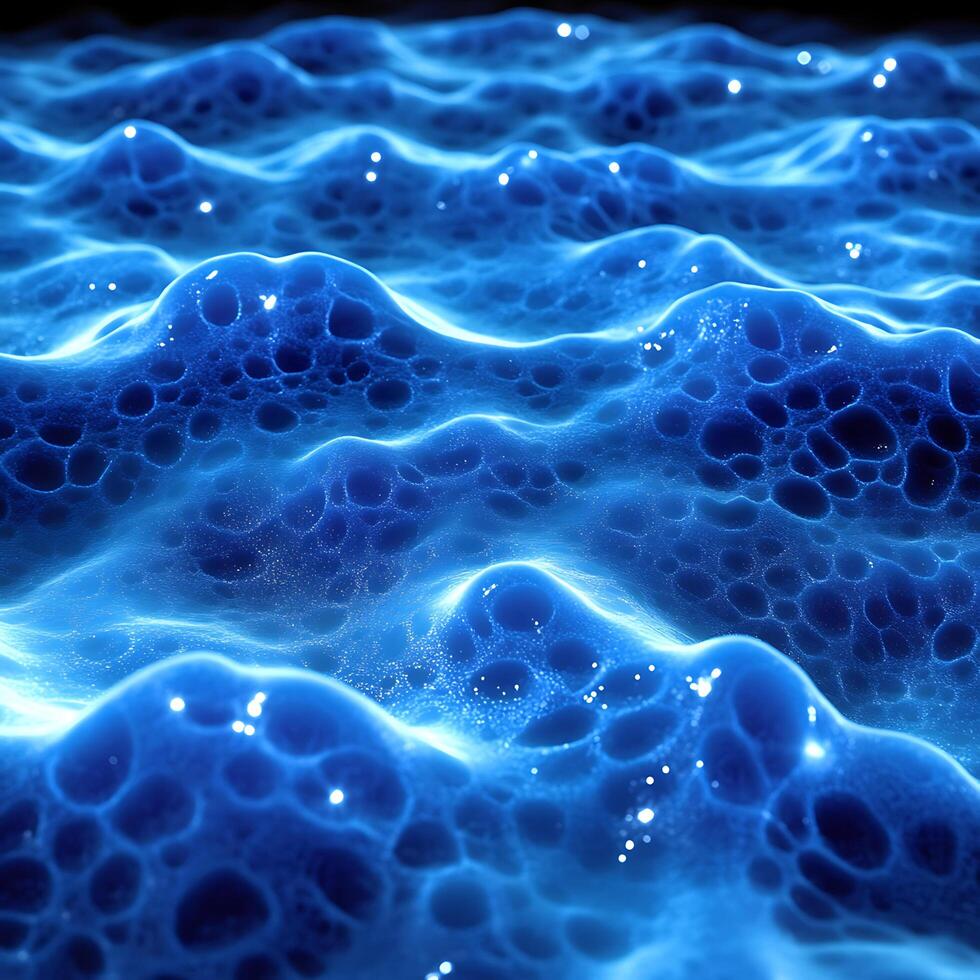 Blue Textured Surface Resembling a Glowing Honeycomb in Waves photo