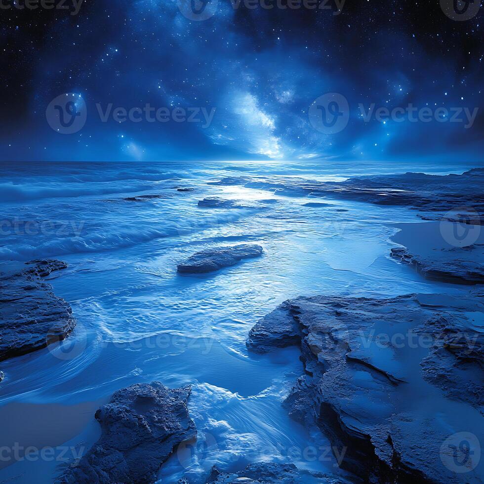 Nighttime Ocean Landscape With Starry Sky and Rocky Tide Pool Reflections photo