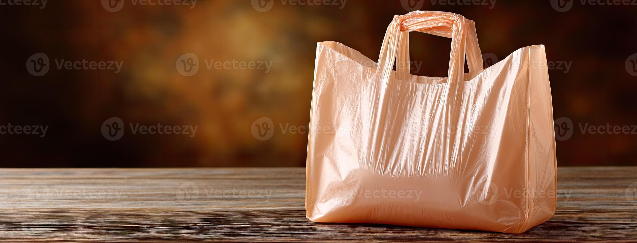 A plastic bag sitting on a wooden table photo