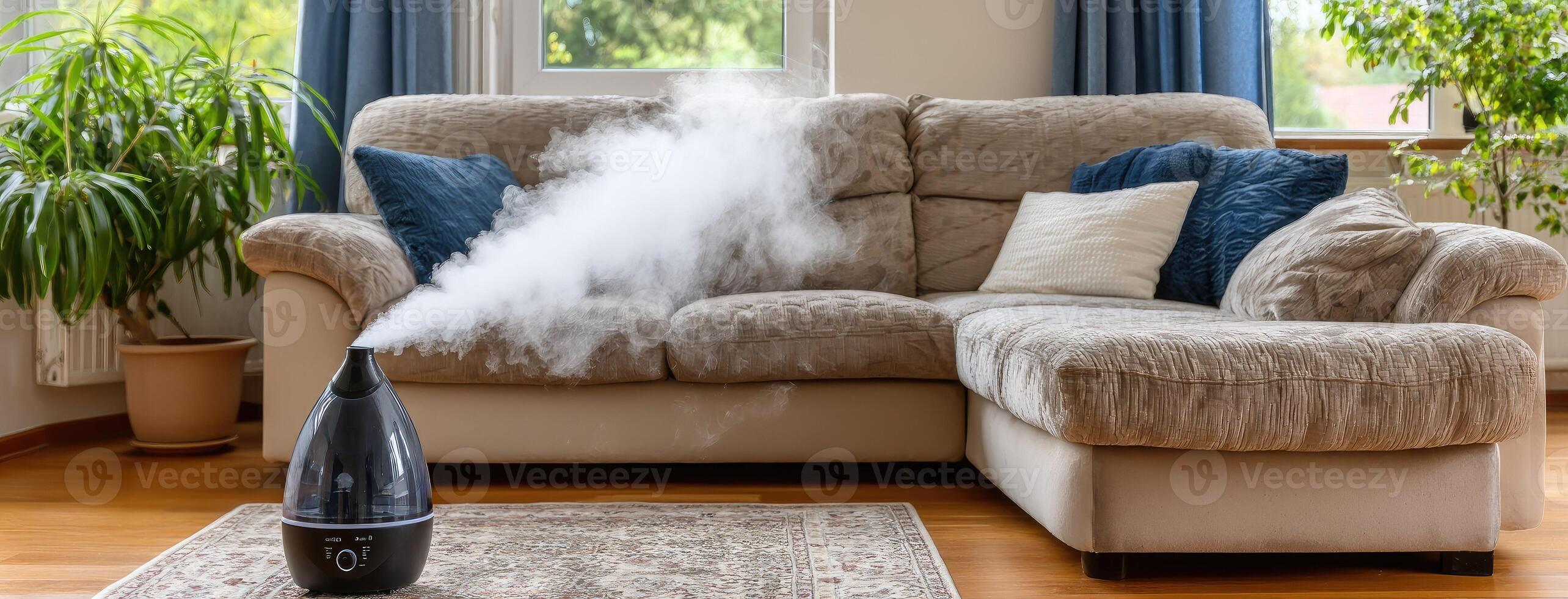 A steam humidifier is blowing smoke into the air photo
