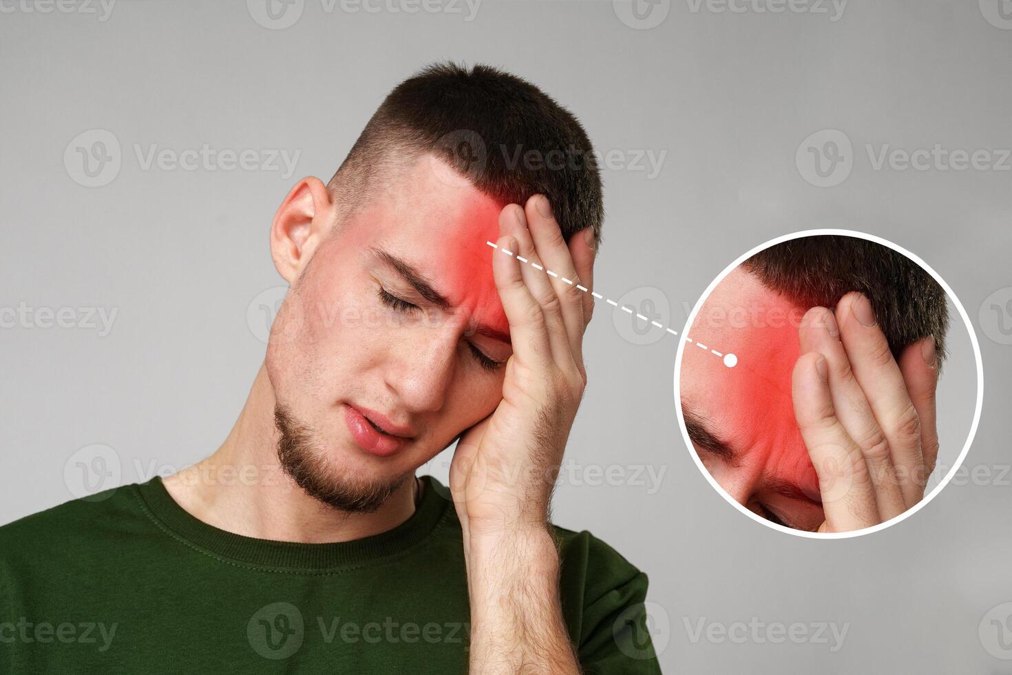 Man experiencing headache with visible discomfort in an indoor setting during daylight hours photo