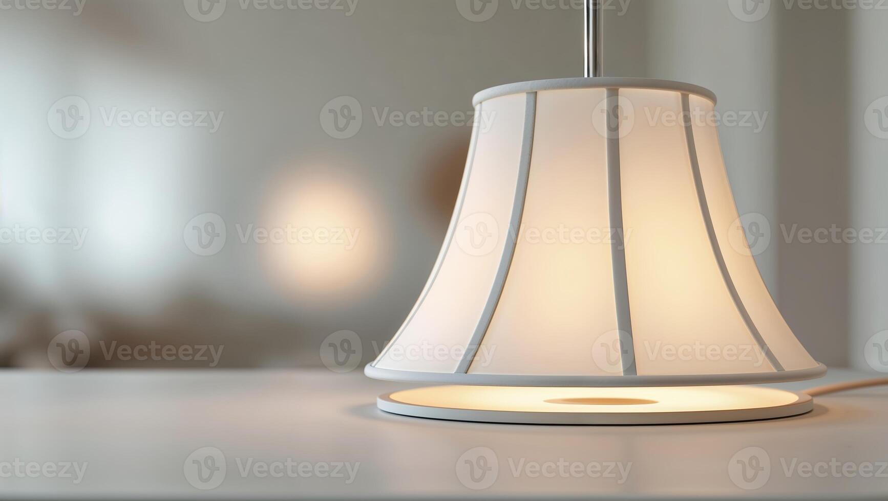 Elegant white table lamp illuminating a cozy room with soft light and modern design photo