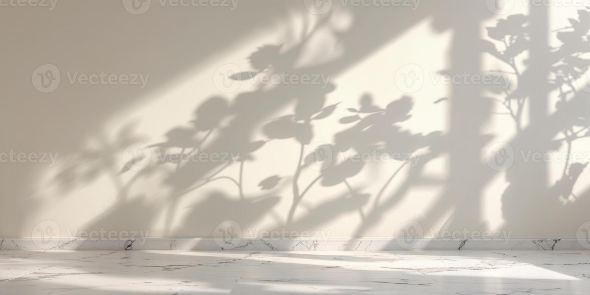 Shadows of plants cast on a white wall by sunlight in a serene indoor setting with marble flooring photo