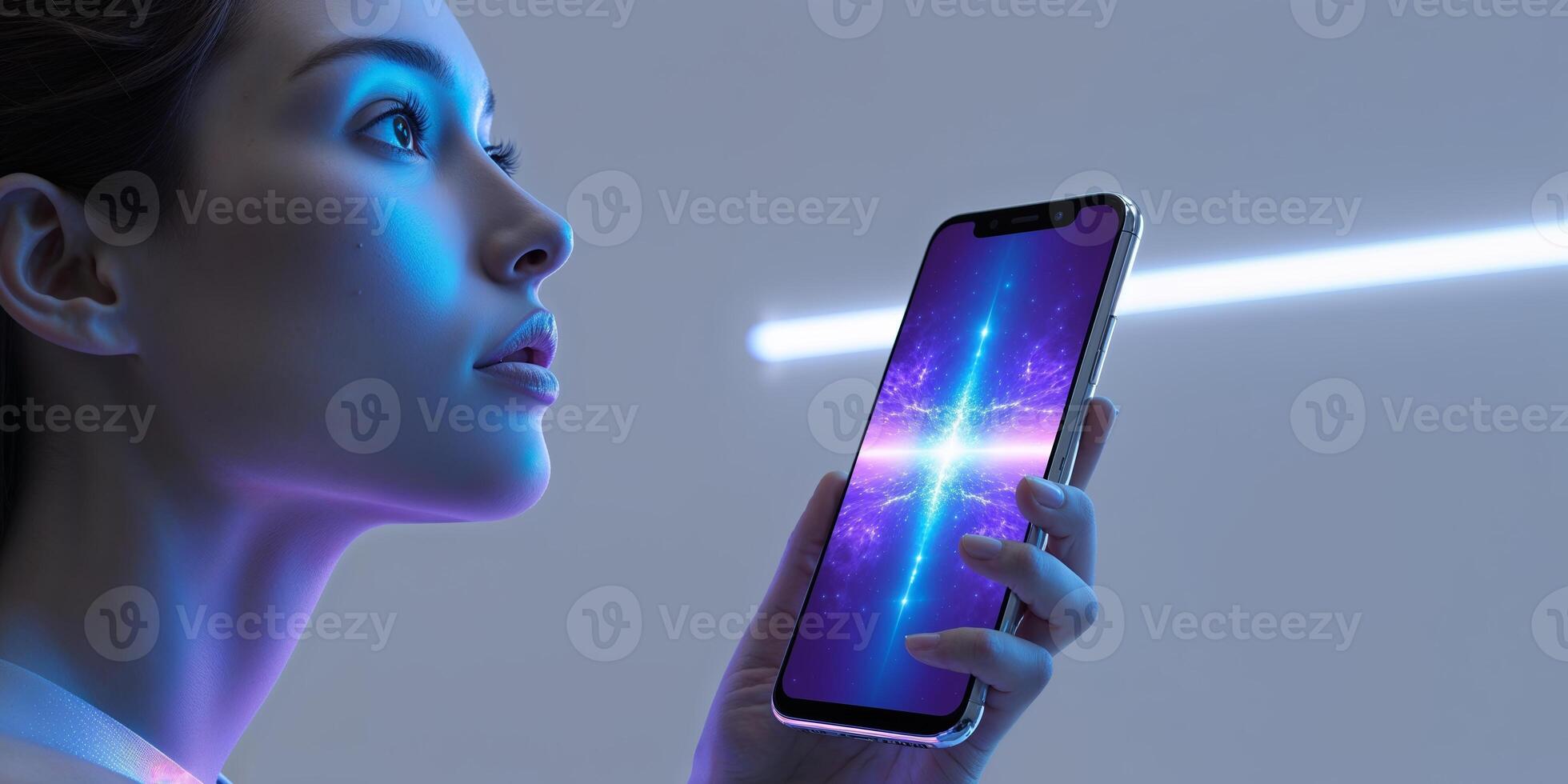 Woman examining smartphone lit by neon lights in a modern environment during evening hours photo