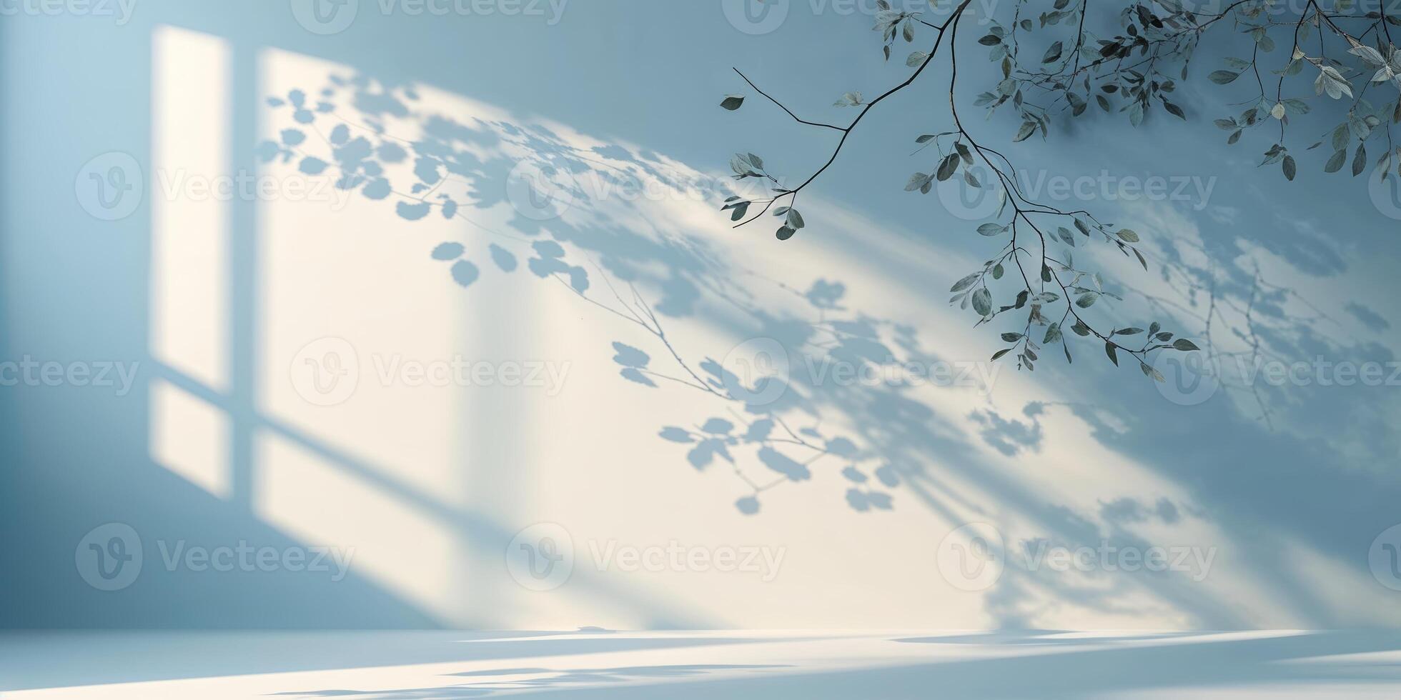 Shadows of leaves casting tranquil patterns on a light blue wall in a serene indoor setting during daylight hours photo