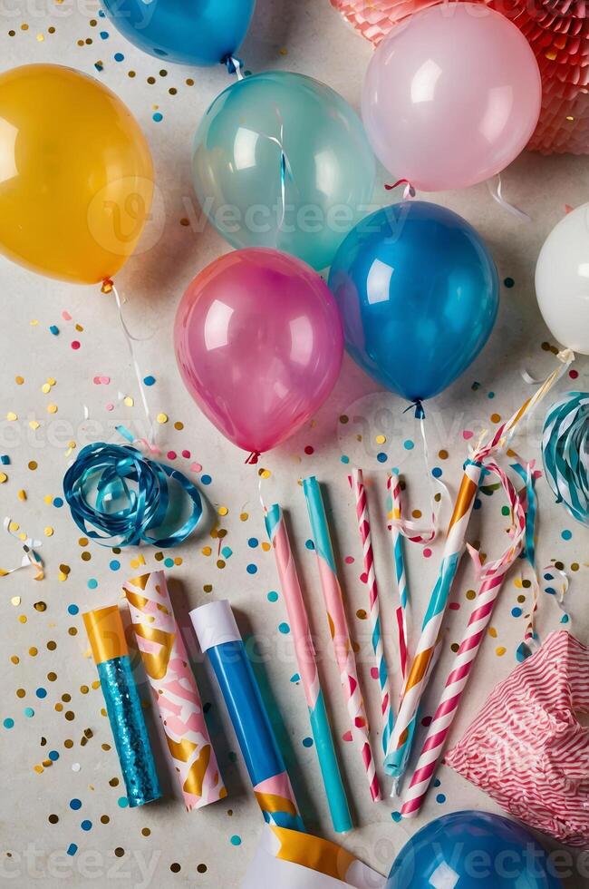 Colorful party decorations with balloons, confetti, and party favors on a festive background photo