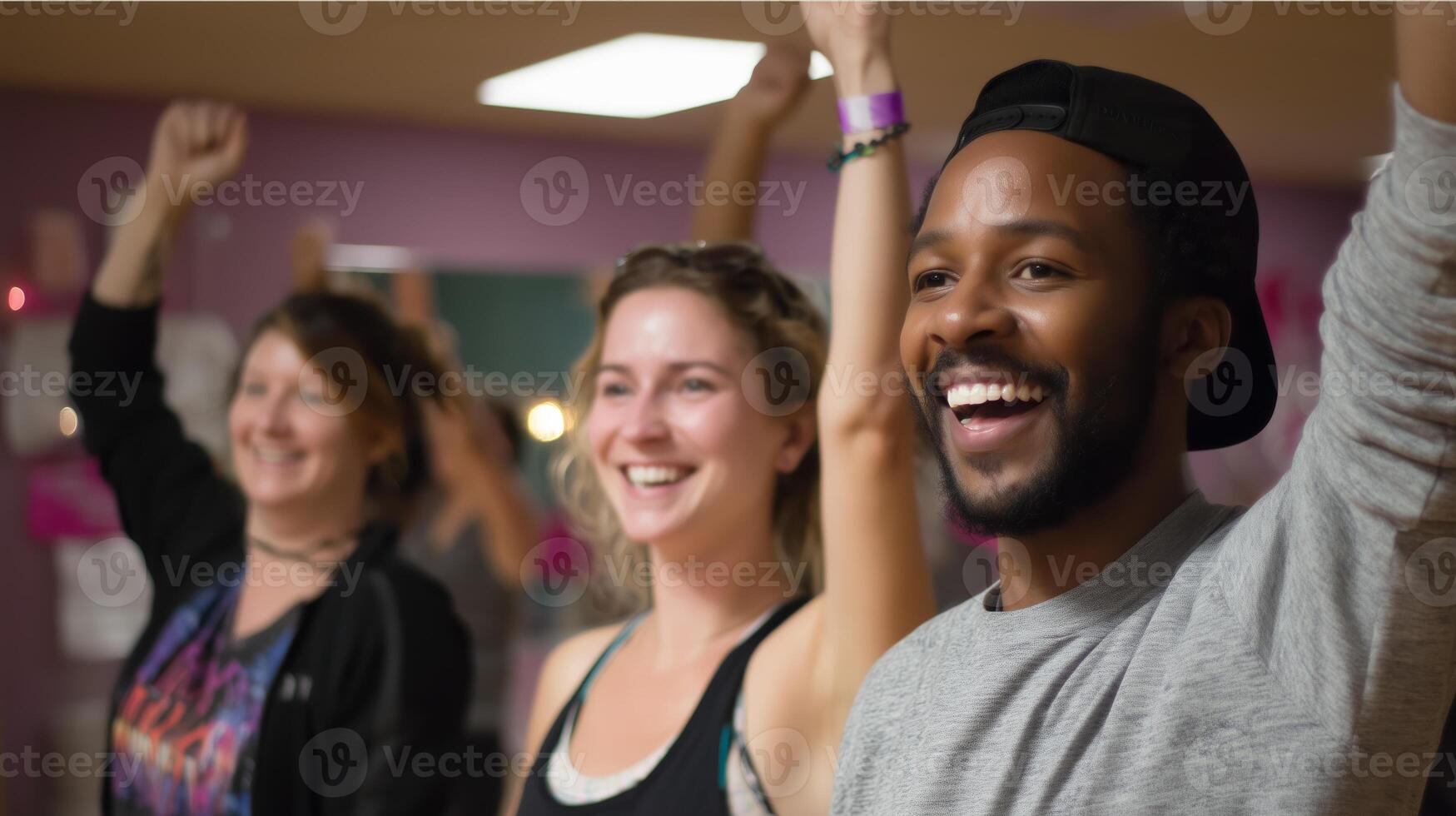 Group of people enjoying a lively dance class in a colorful studio during the afternoon photo