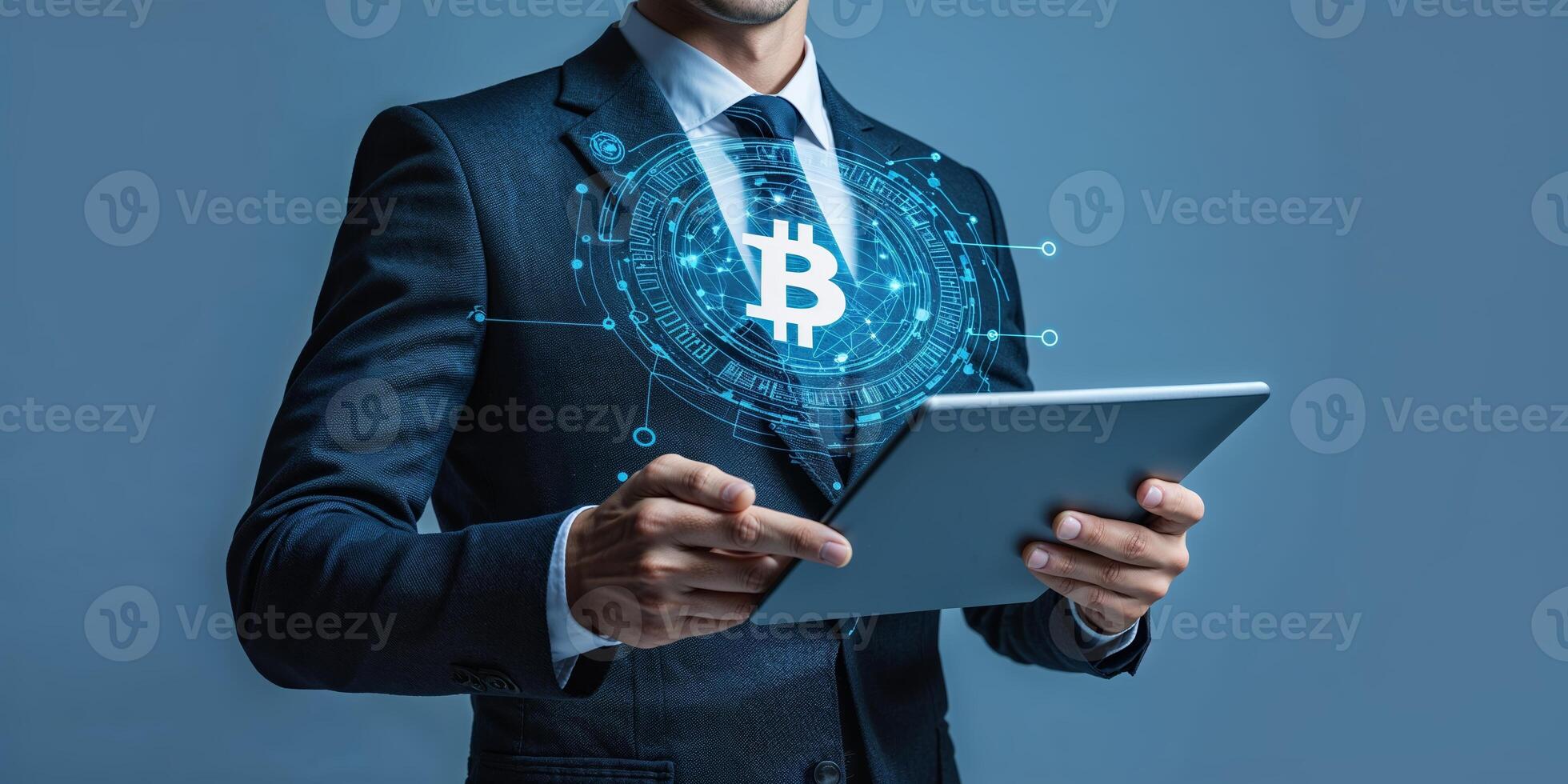 Business professional interacts with digital bitcoin symbol on tablet in modern office setting during daytime photo