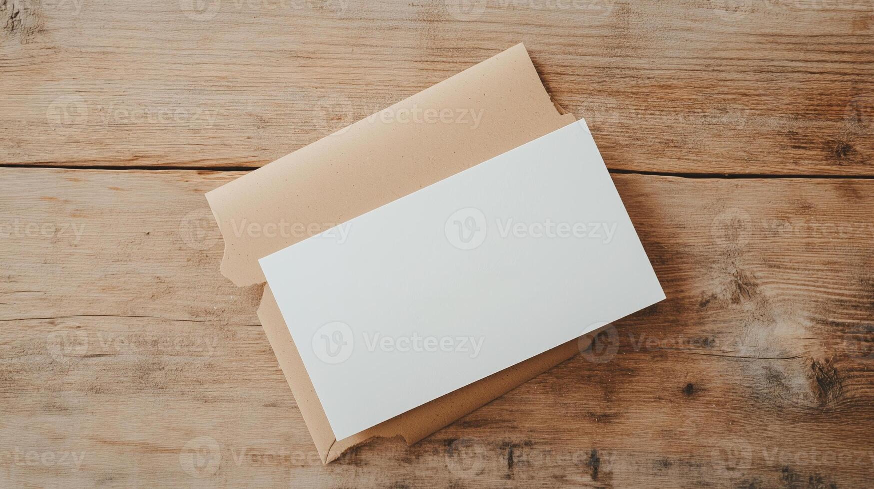 Blank stationery and envelope on rustic wooden table for creative projects and correspondence photo